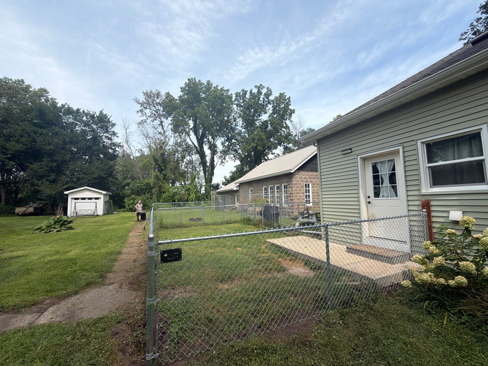 Galvanized Chain Link Fence and Gate Installation in La Porte City by Perfect Picket Fence and Stain