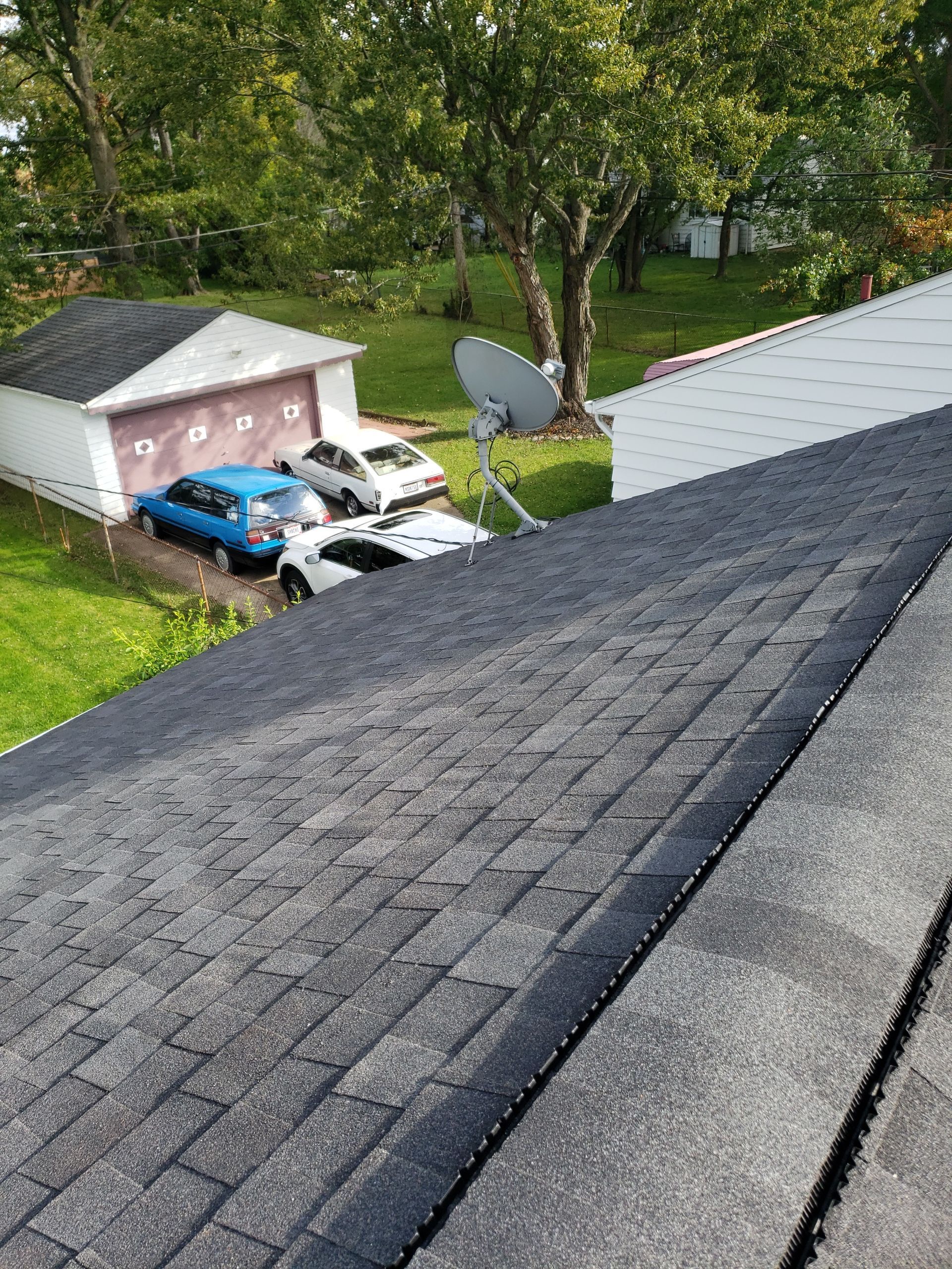 ATLAS PINNACLE COLOR: PRISTINE BLACK SHADOW DRIP EDGE: WHITE by Eagle Eye Roofing