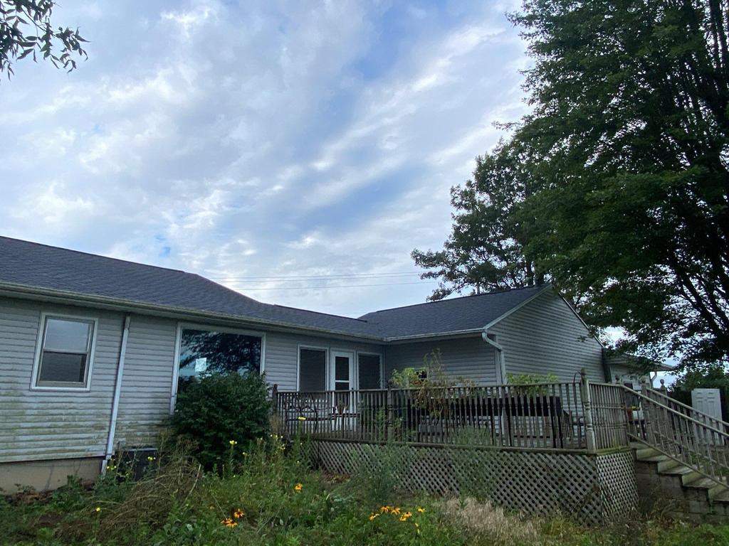 Storm damage roof replacement by Nitro Roofing and Construction