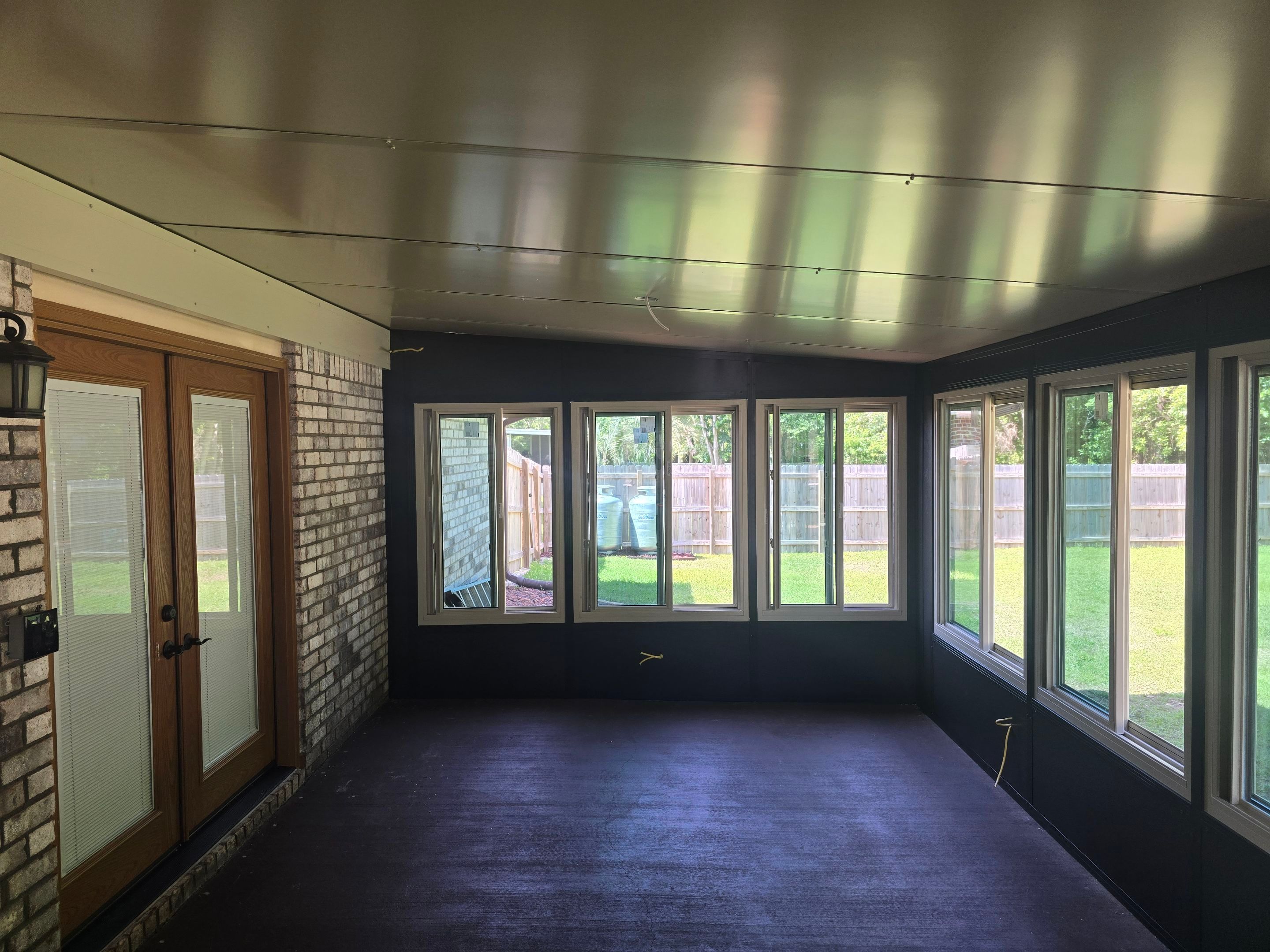 Glass Room & Patio Cover using Colorbeam by Titan Sunrooms