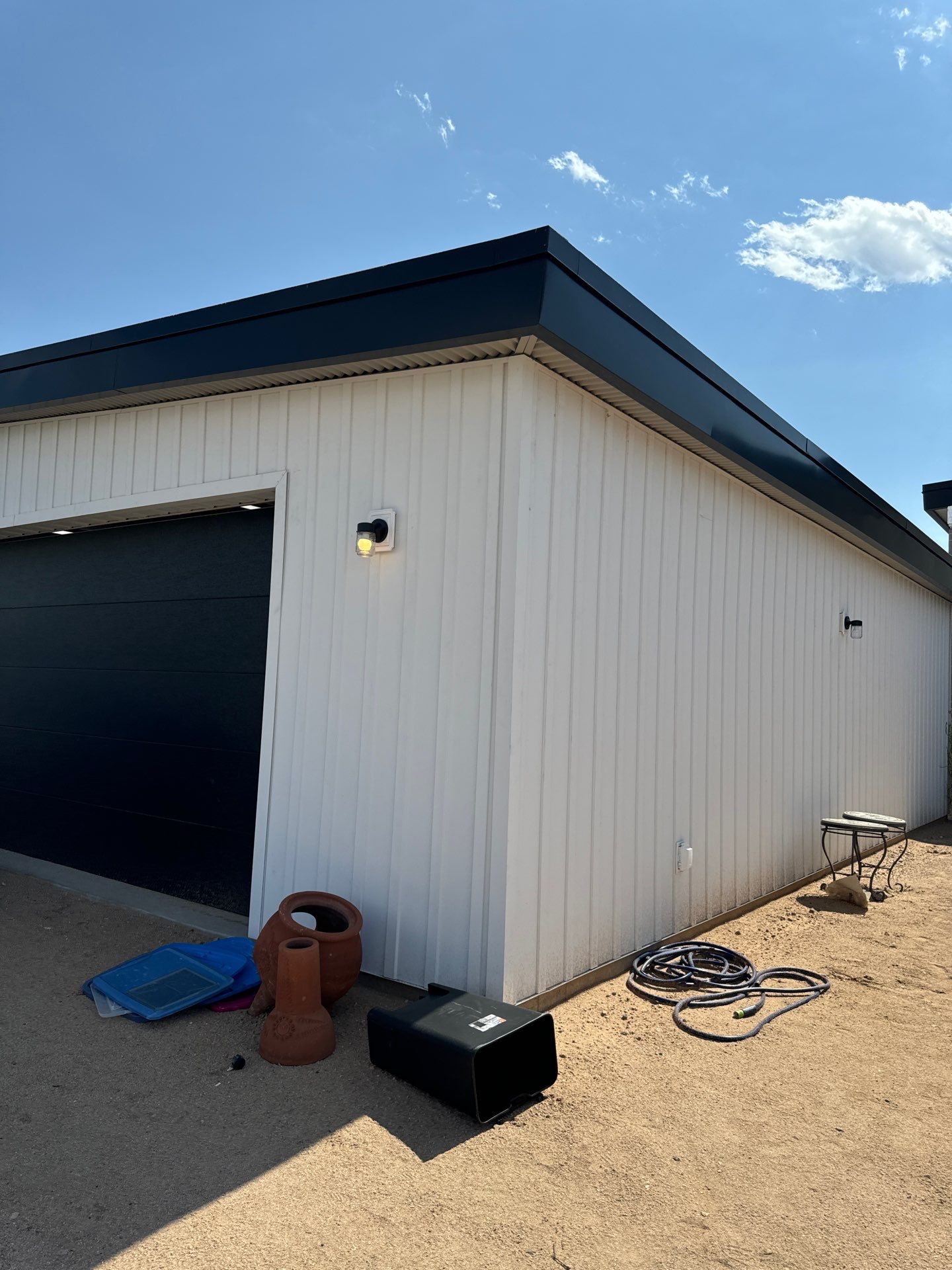 Polar White Metal Siding by Reimagine Roofing