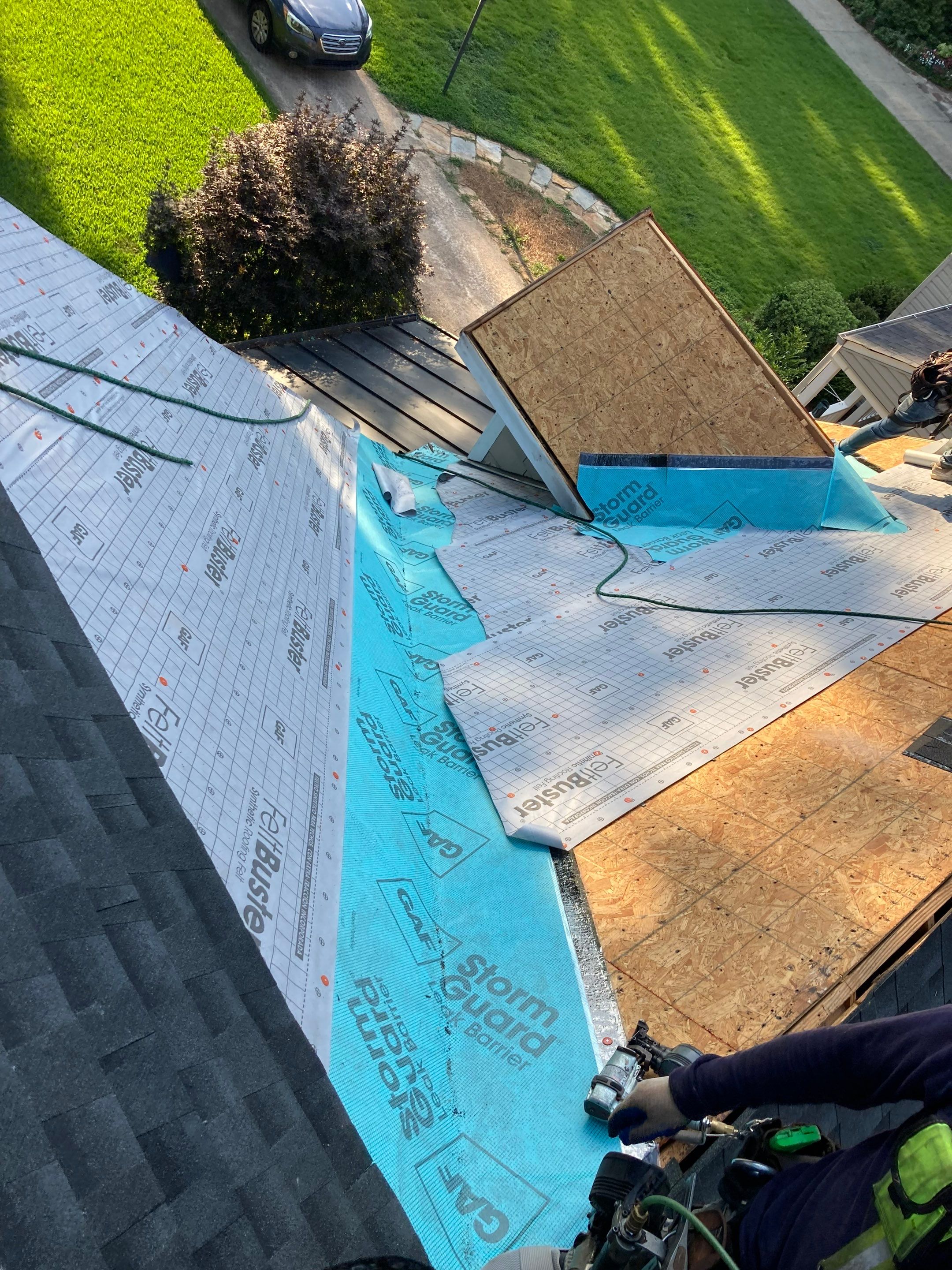 Residential Roofing Installation using Architectural Shingles by The Roofing Dudes