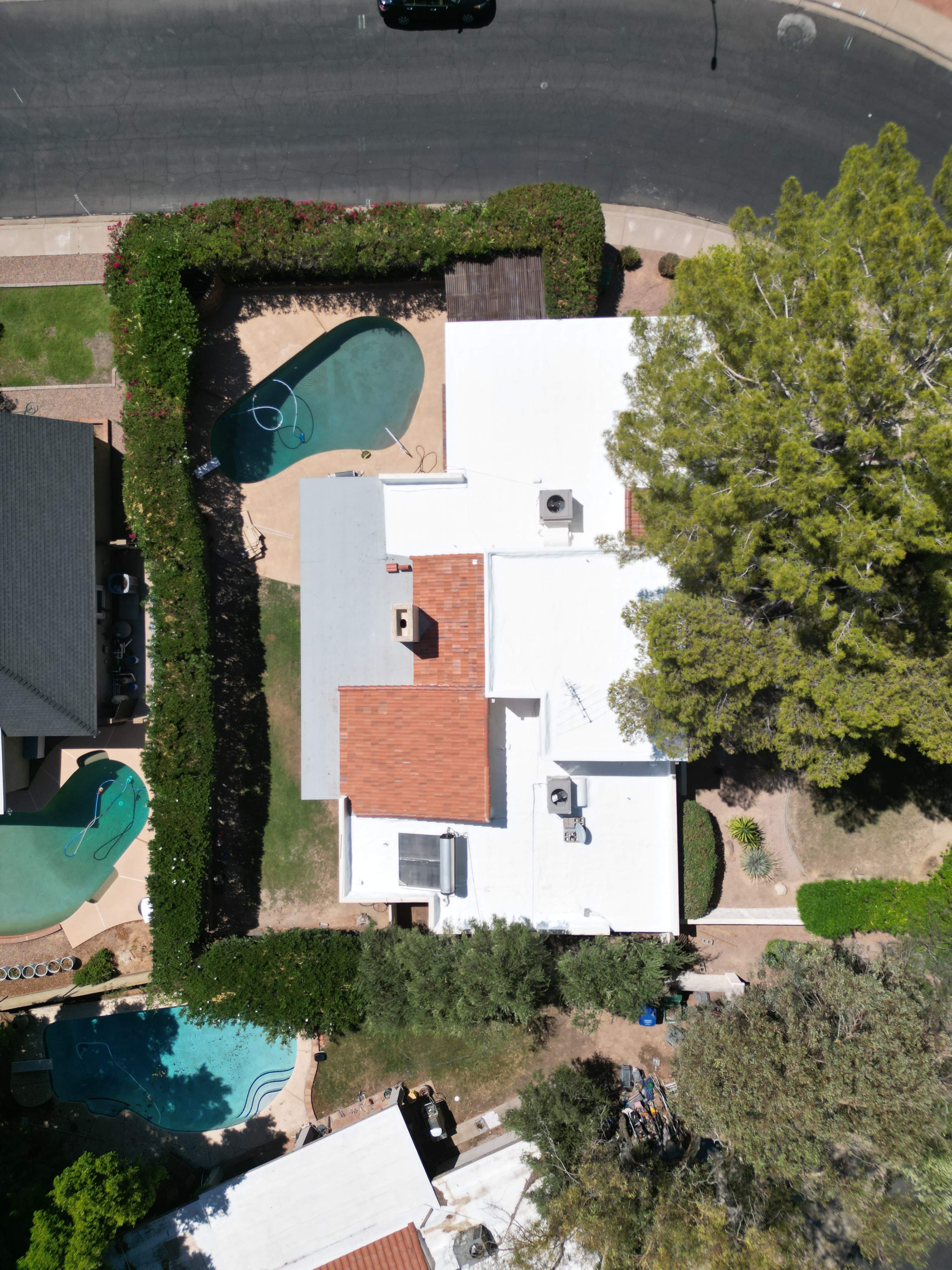 Re-coat & Tile Job by All Storm Roofing & Construction