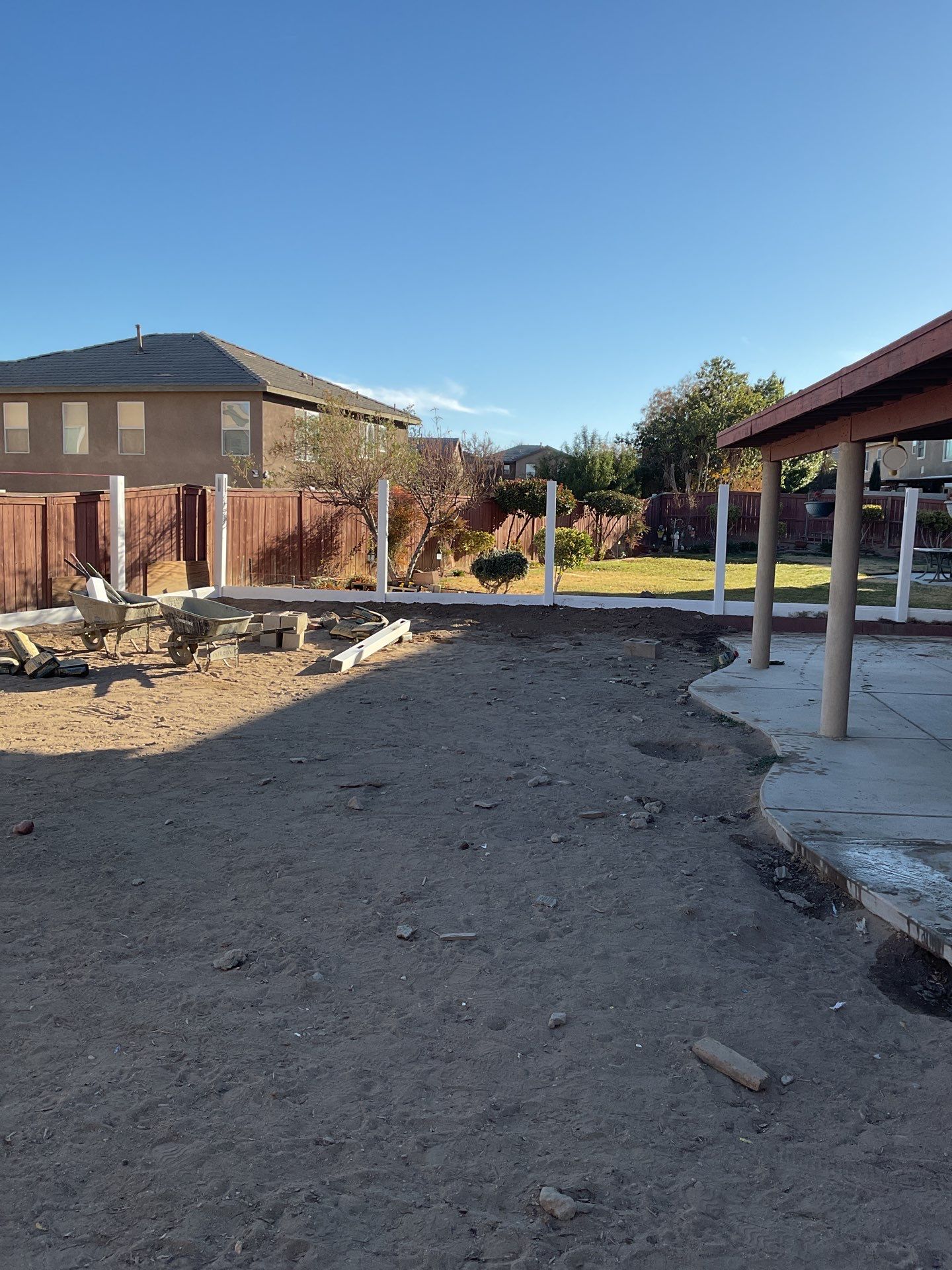 Fence installation using wood by Fence Guys Inc.