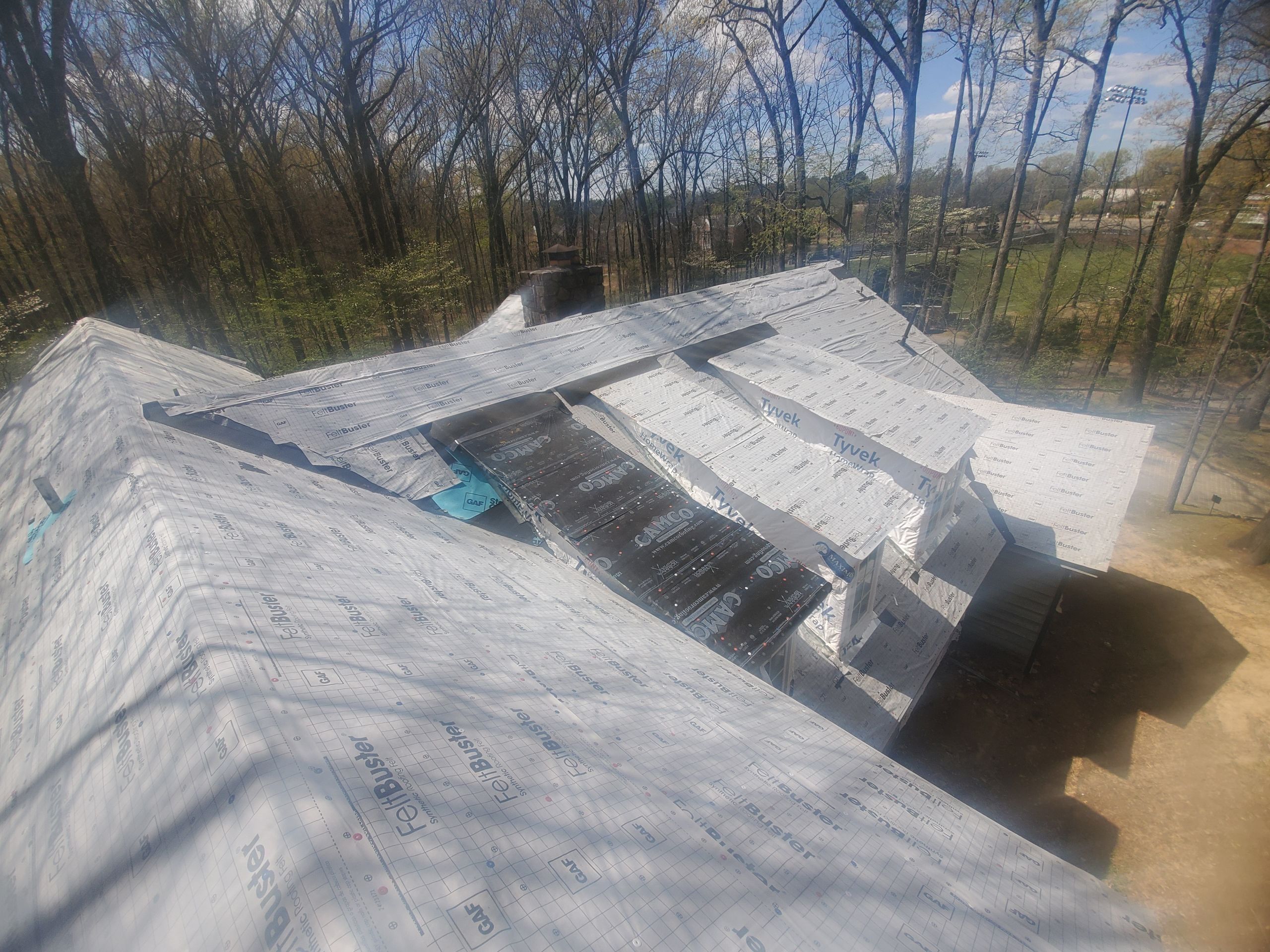 Residential Roof Replacement and Flat Roof Membrane in Memphis by Revival Roofing Services