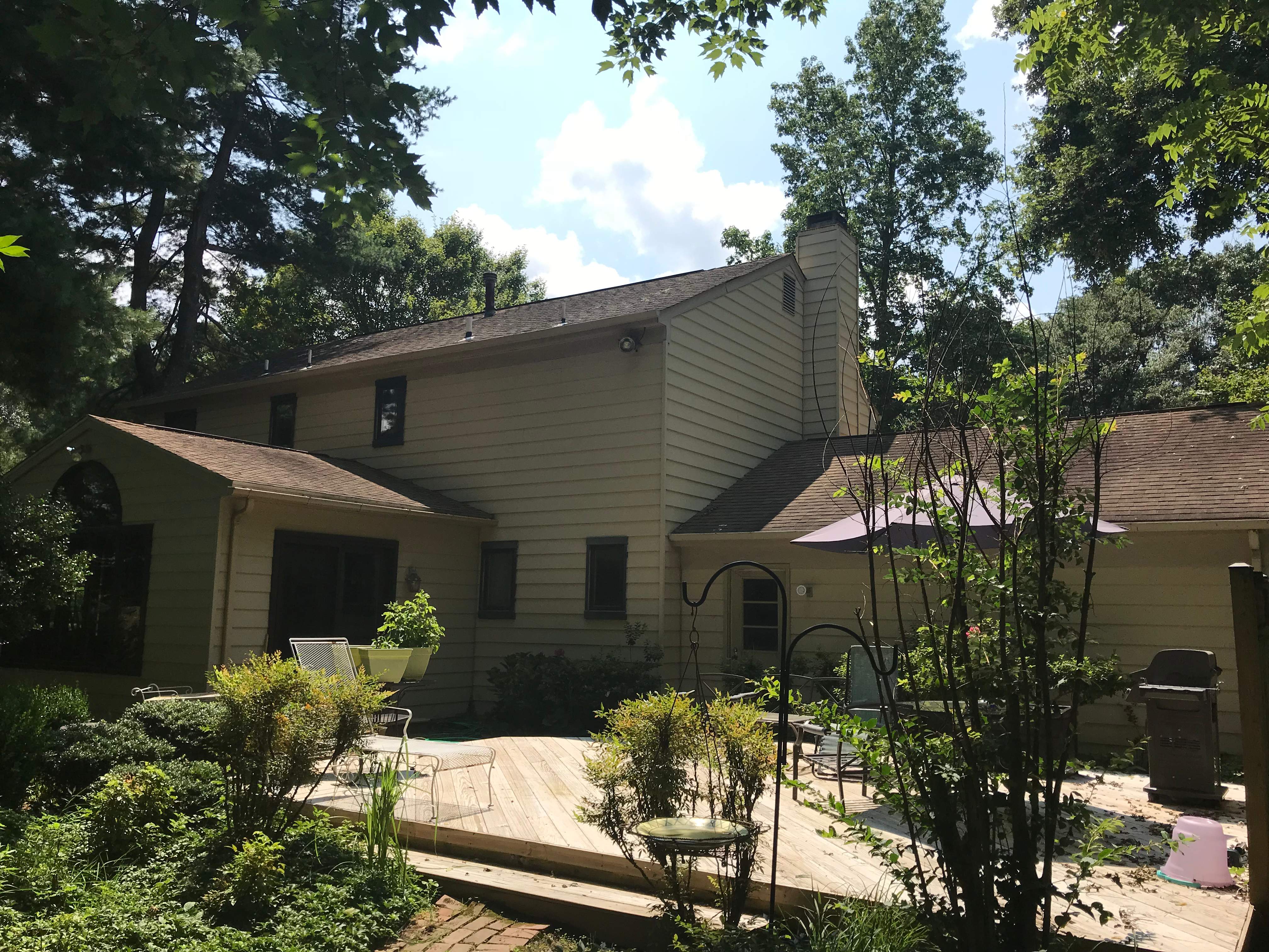 Residential Roofing Installation using Landmark Shingles Color Weatherwood by Alpha Design Services