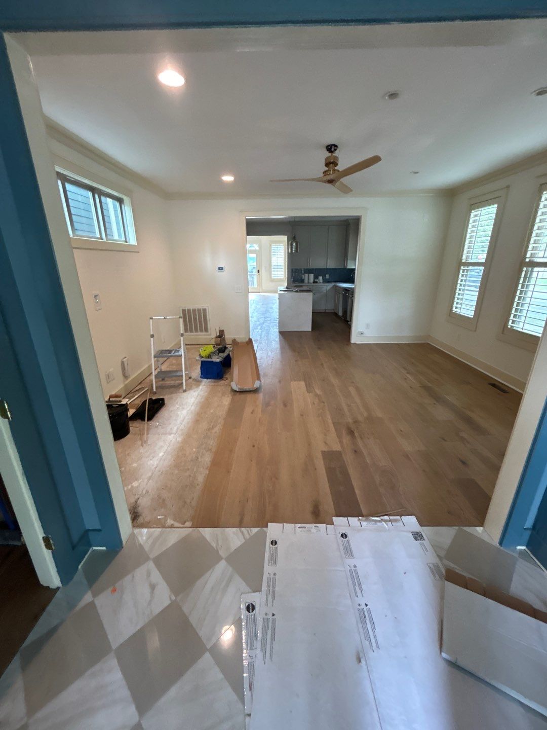 White Oak Hardwood and Checkerboard Tile Installation by Footprints Floors of Nashville