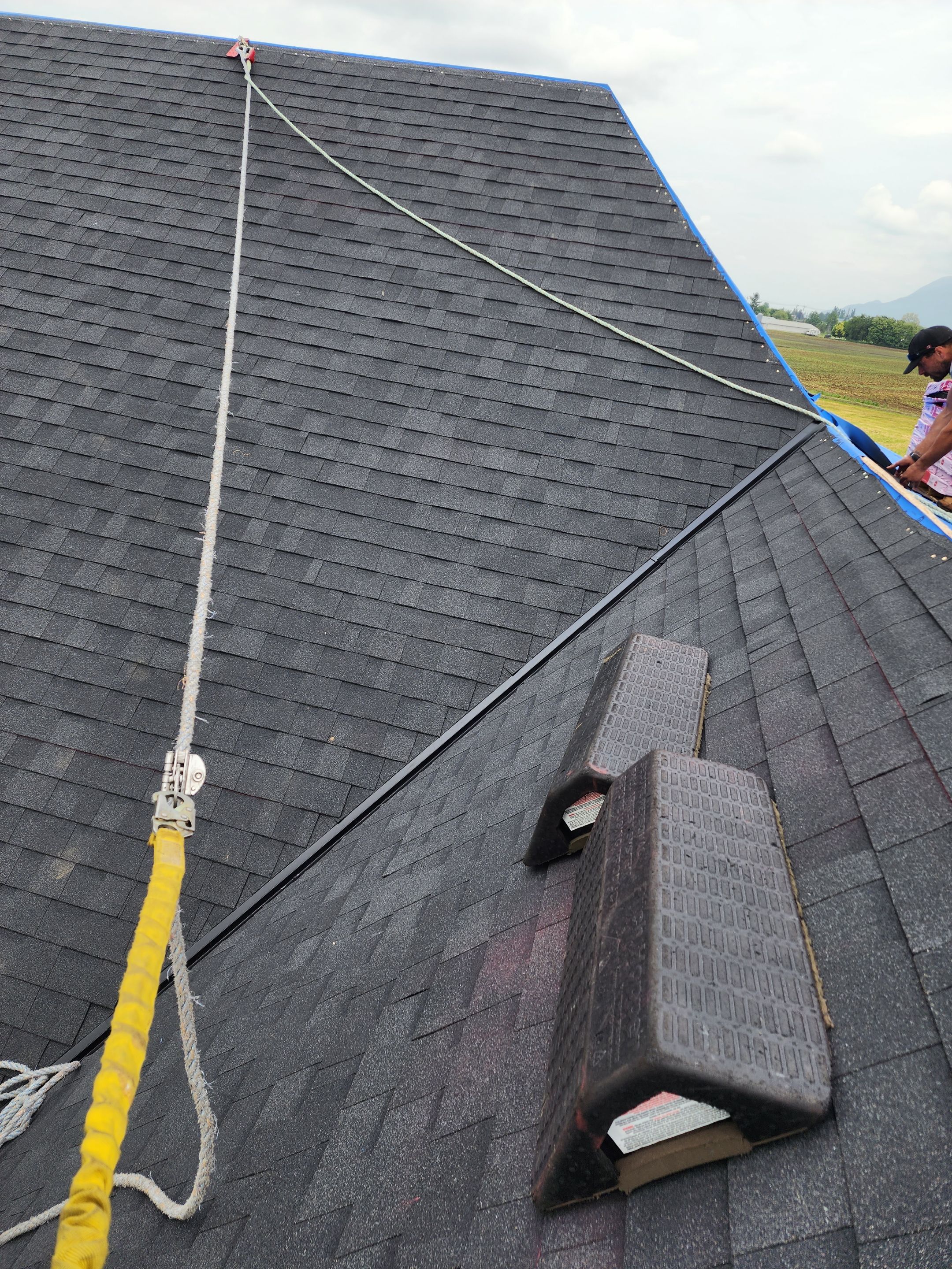 Residential Roofing Installation using OC Oakridge shingles by Top Notch Roofing Inc