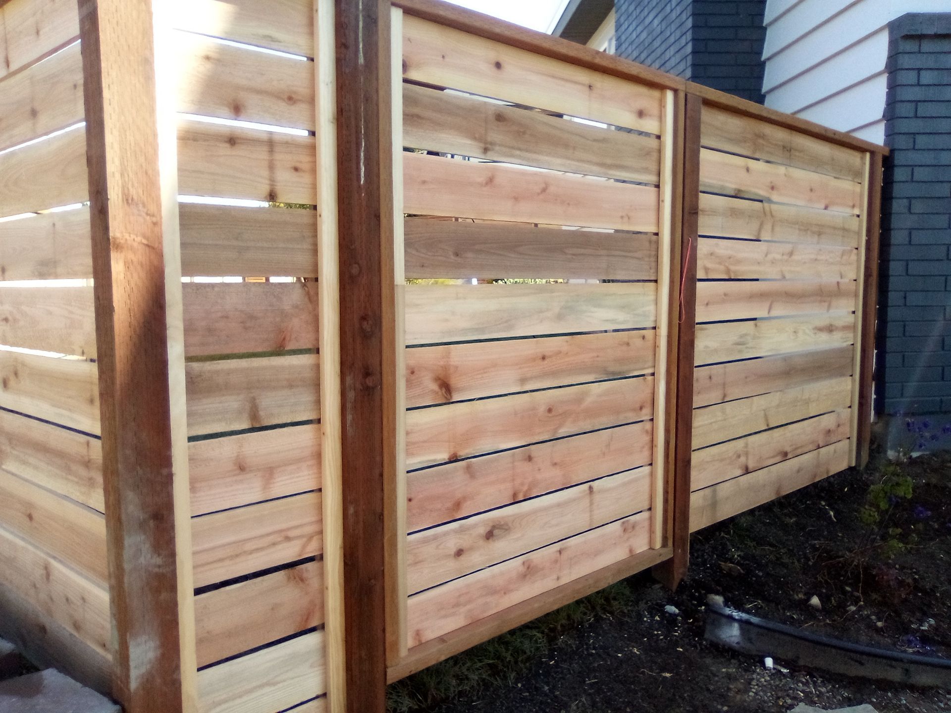 Retaining Wall & Fence Installation  by Jireh Asphalt & Concrete Inc 