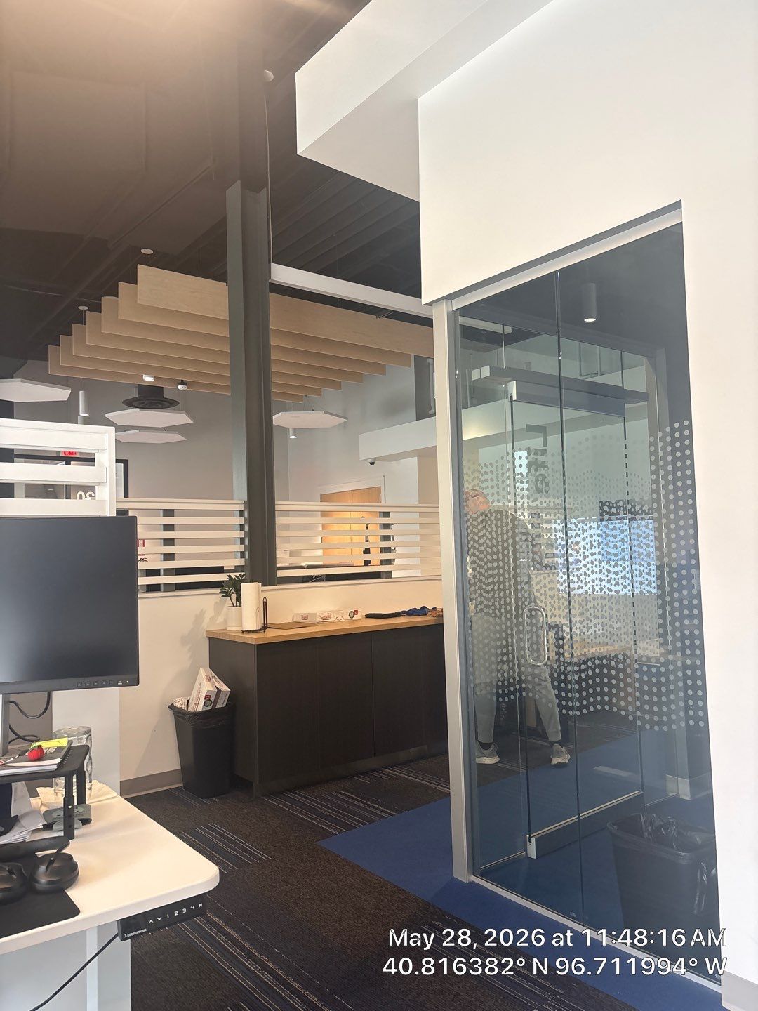 Modern Office Remodel with Acoustic Baffles and Glass Partitions by CompanyCam Sales Demo