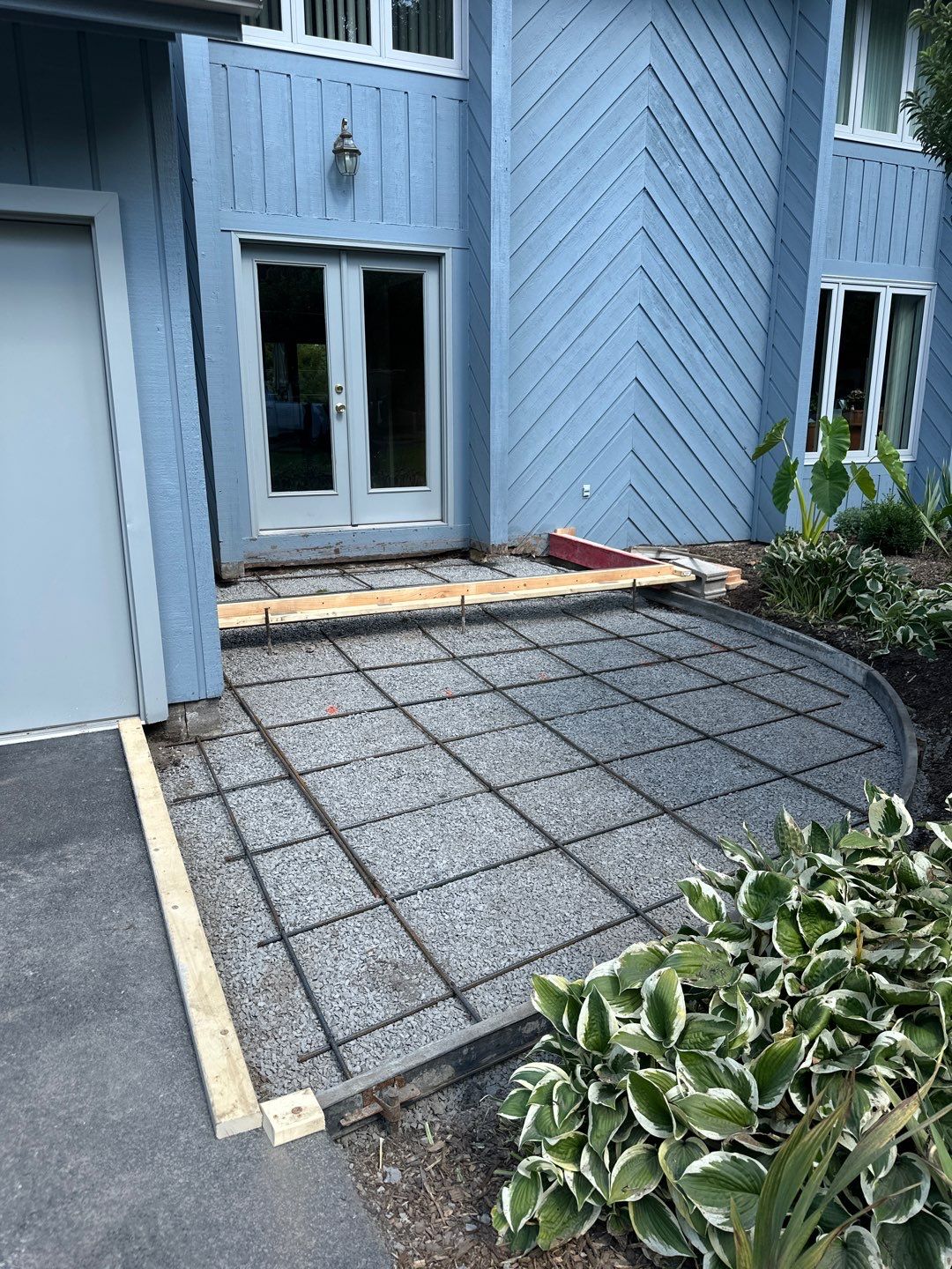 Charcoal Release Border with Broom Finish  by NG Masonry & Construction LLC