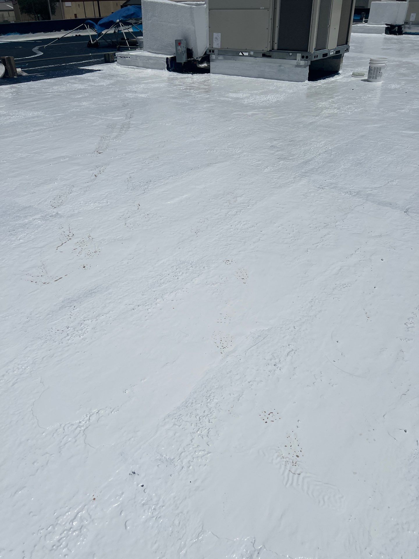 Dirty leaking Gravel Roof by Bayfront Roofing and Construction