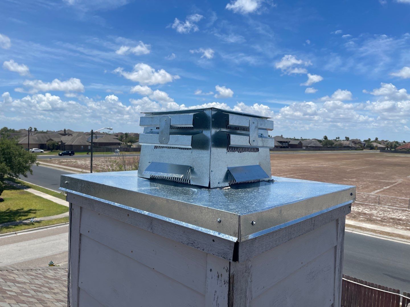Chimney Cap Replacement using Custom Fabricated Steel by Lighthouse Roofing