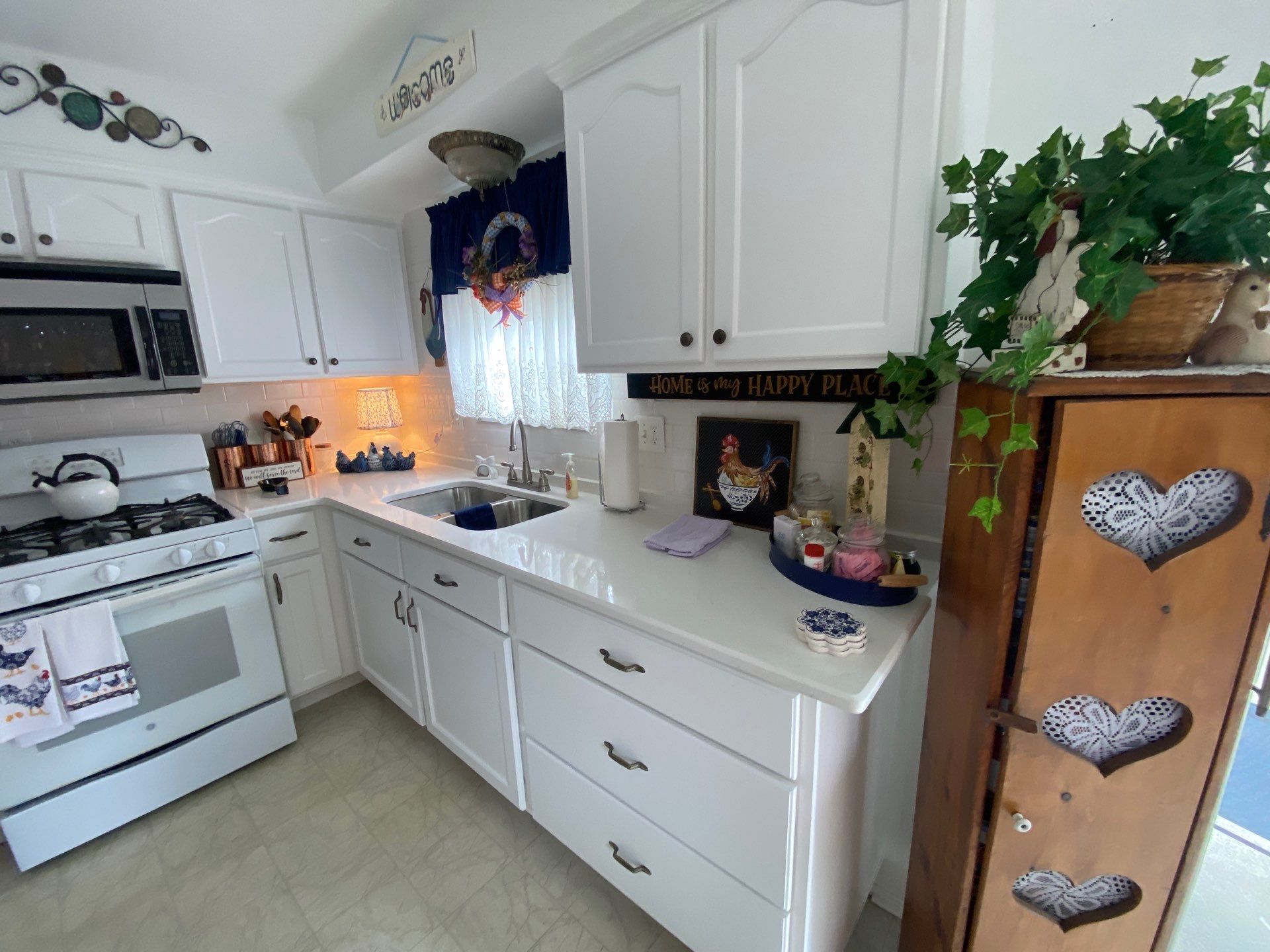 White Shaker Cabinet Refinishing and Painting in Sterling Heights by Top Shelf Painter