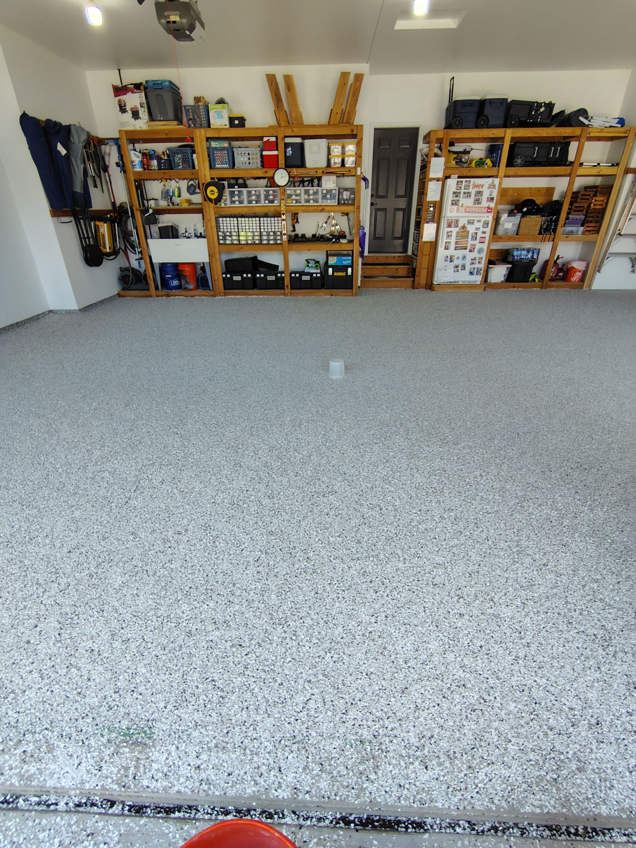 Coyote Garage Floor Coating in Sioux Falls by Select Painting, Coatings & Garage Cabinets
