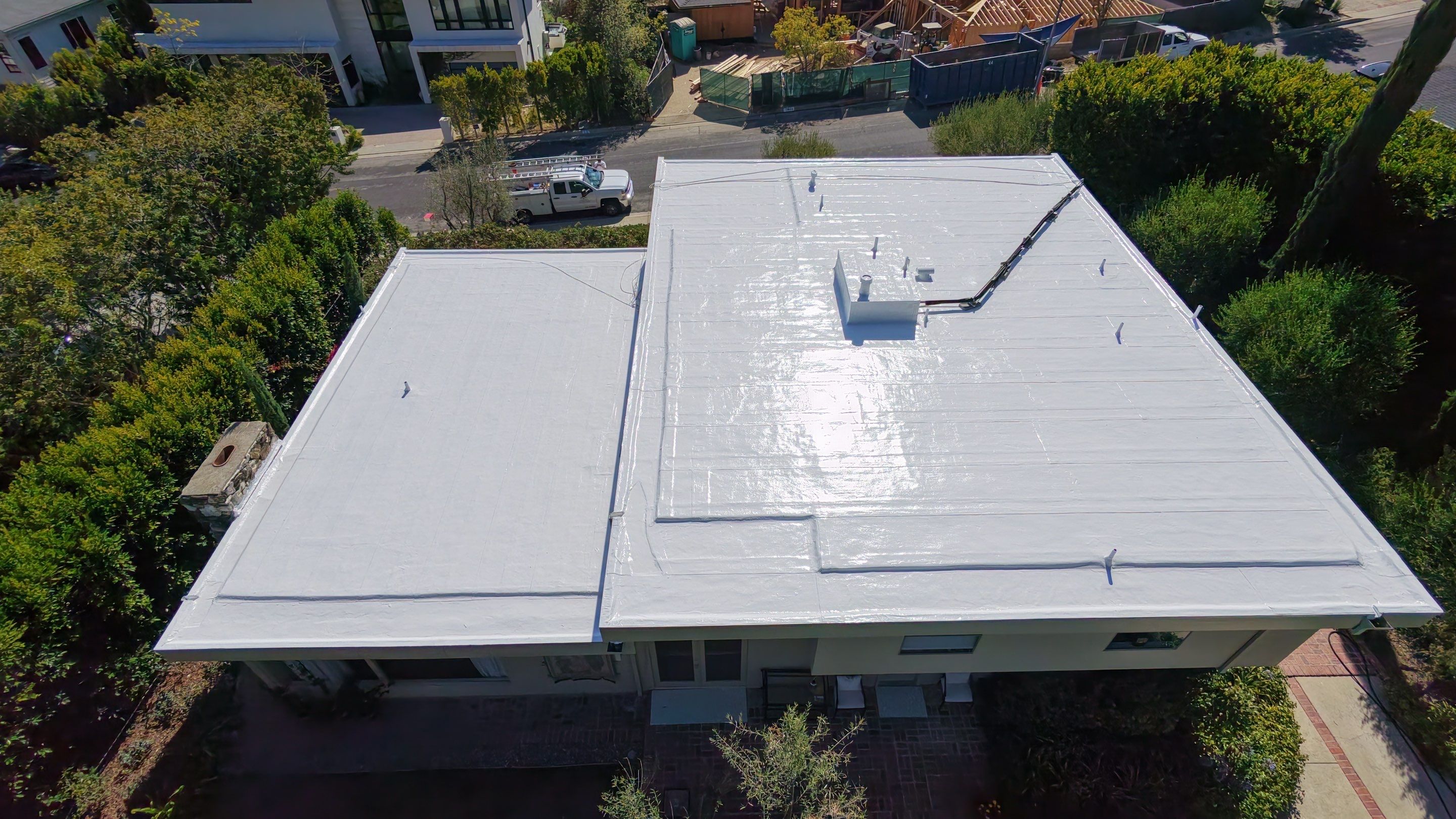 Flat Roof Reflective Coating and Repairs in Brentwood by Hull Brothers Roofing