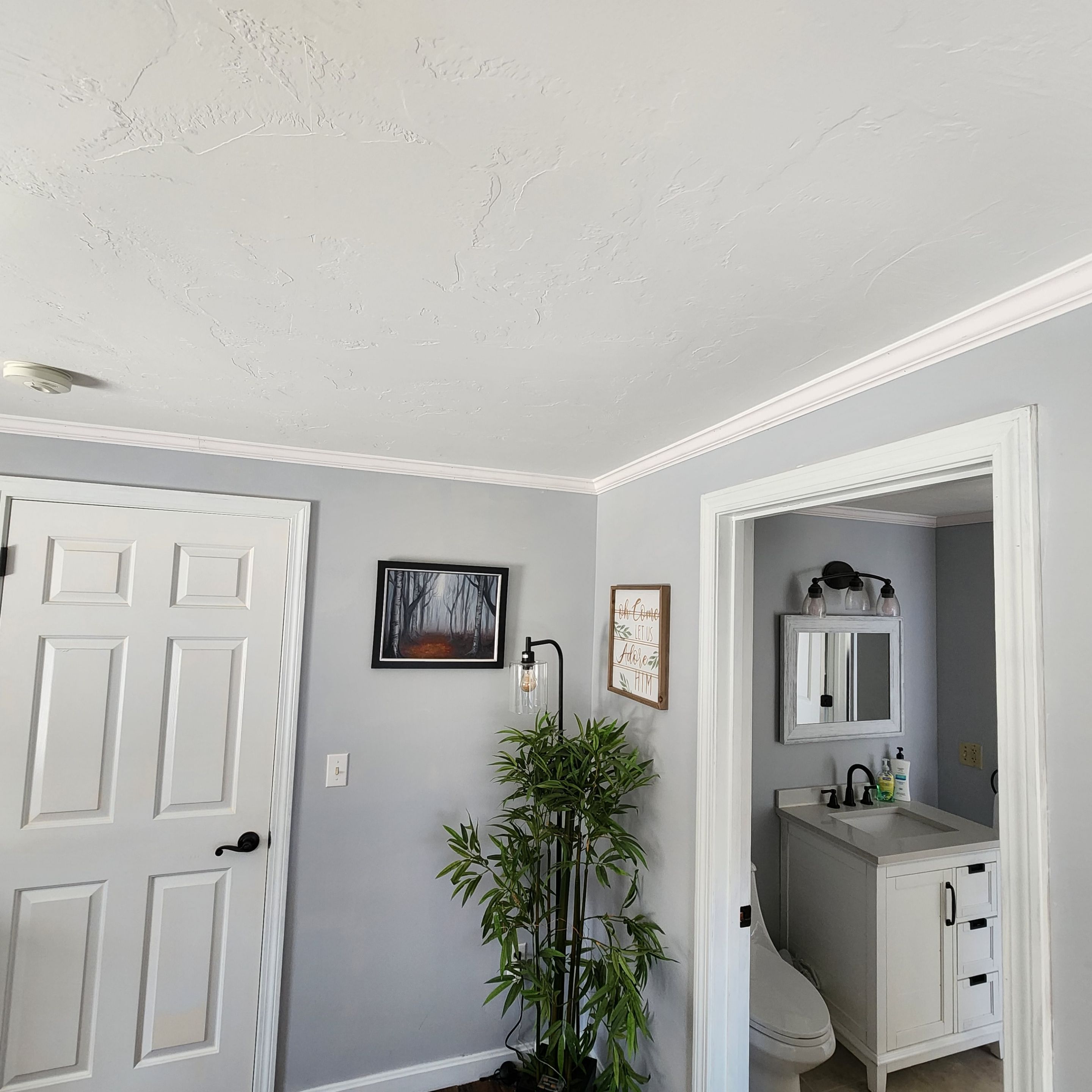 Crown molding installed throughout the first floor in this home. by Freedom Handyman Services