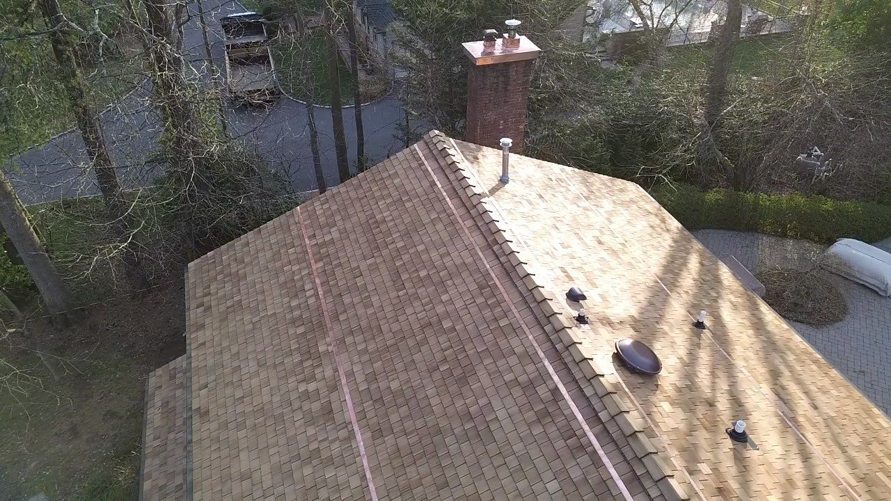 Roof Replacement using Cedar Shakes by CMNG LLC