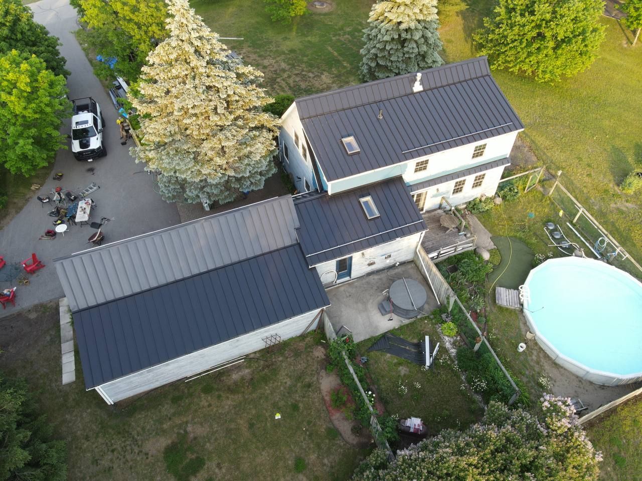 Residential Roofing Installation using 24 Ga Standing Seam Metal  by Jay Carter Roofing & Sheet Metal