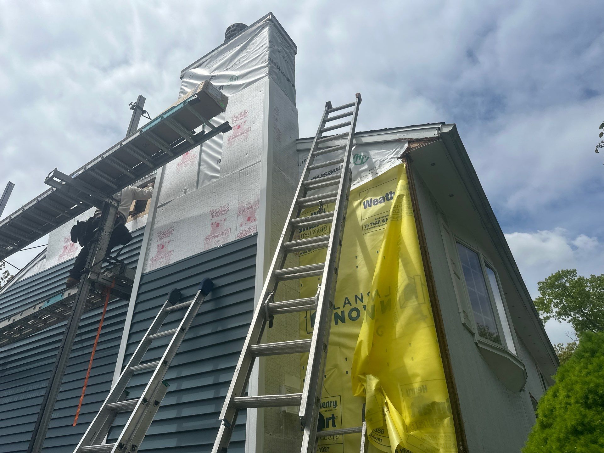 Siding Installation using Certainteed Cedar Impressions Straight Edge Perfection Shingles - D7 - Pacific Blue by A Plus Exterior