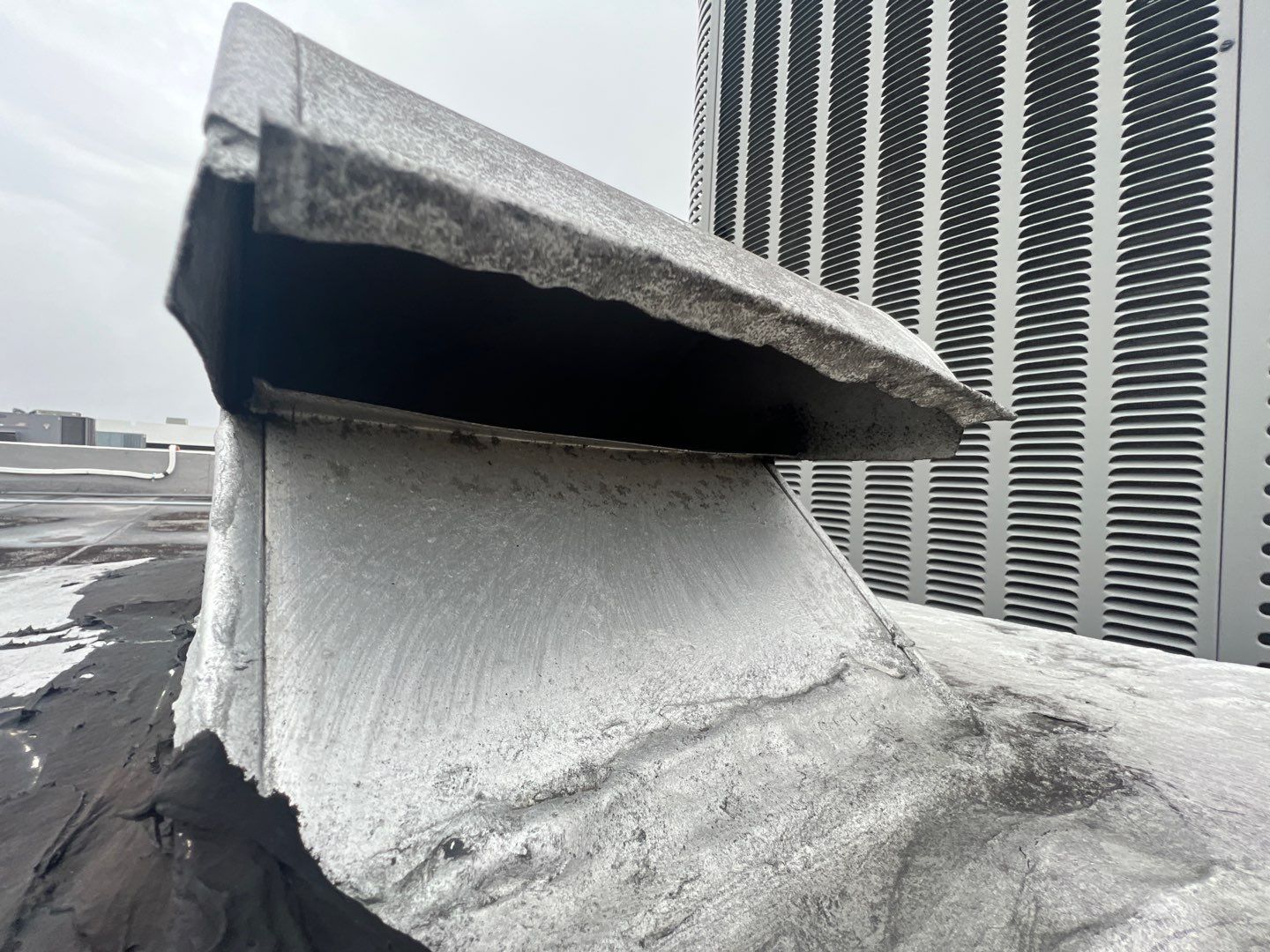 Commercial Roofing Repair using Roof Sealant by Four Peaks Roofing