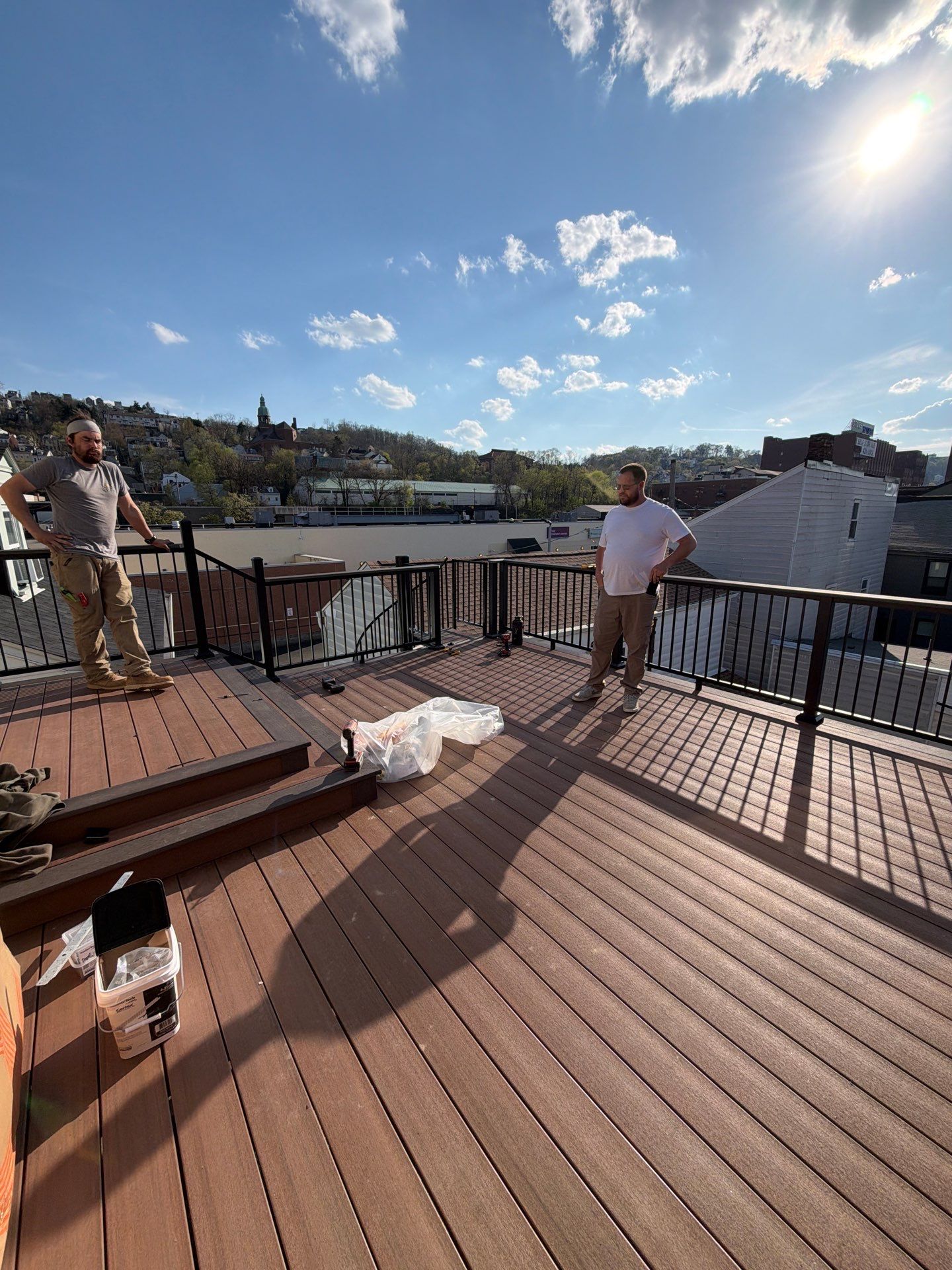 Larry Dietrich Spiral stair and deck by Cousins Roofing Siding & Decks
