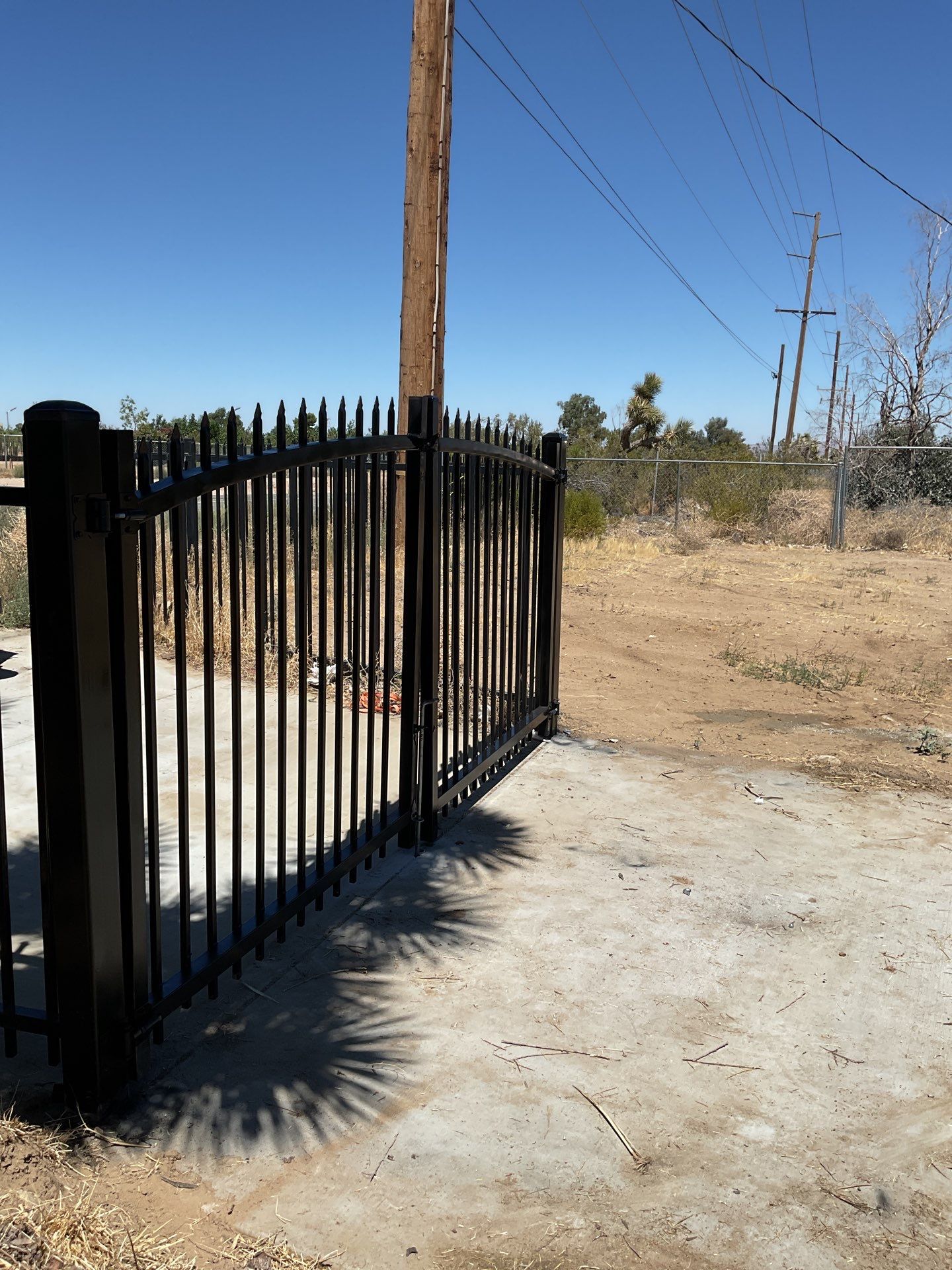 Gate installation using Wrought Iron by Fence Guys Inc. 