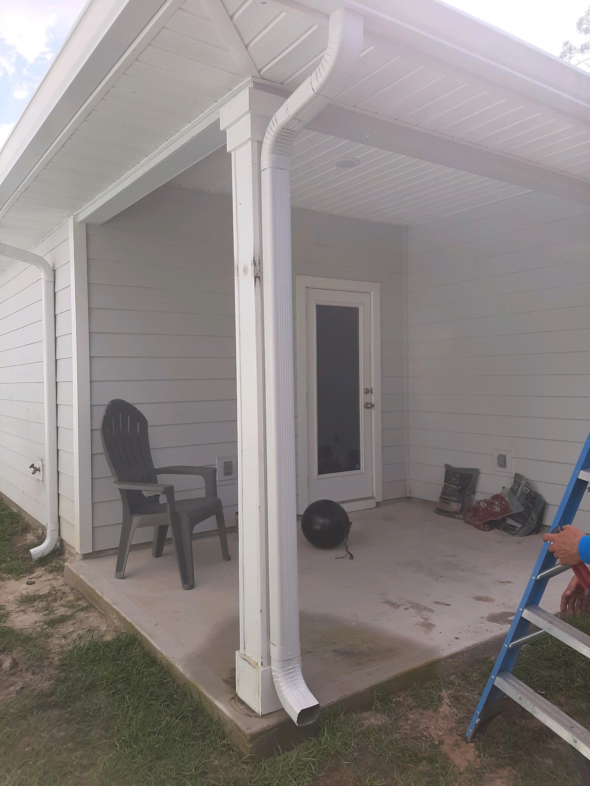 Seamless Gutter Installation using White by Gutter Professors