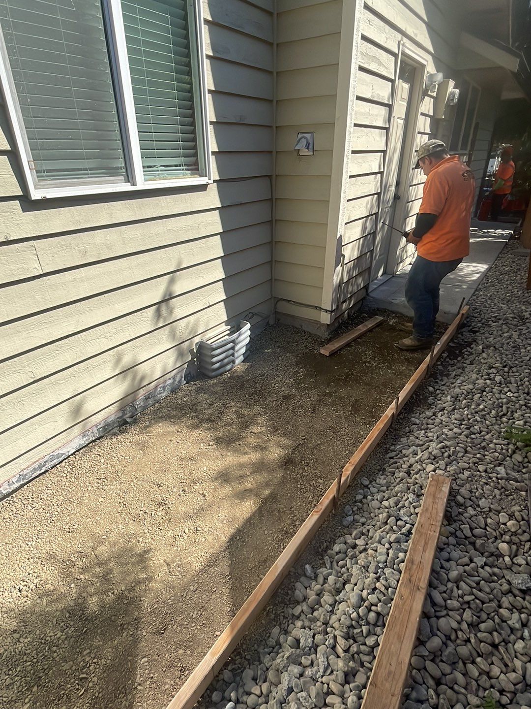 Joan | Concrete Driveway & Walkway   by Jireh Asphalt & Concrete Inc 