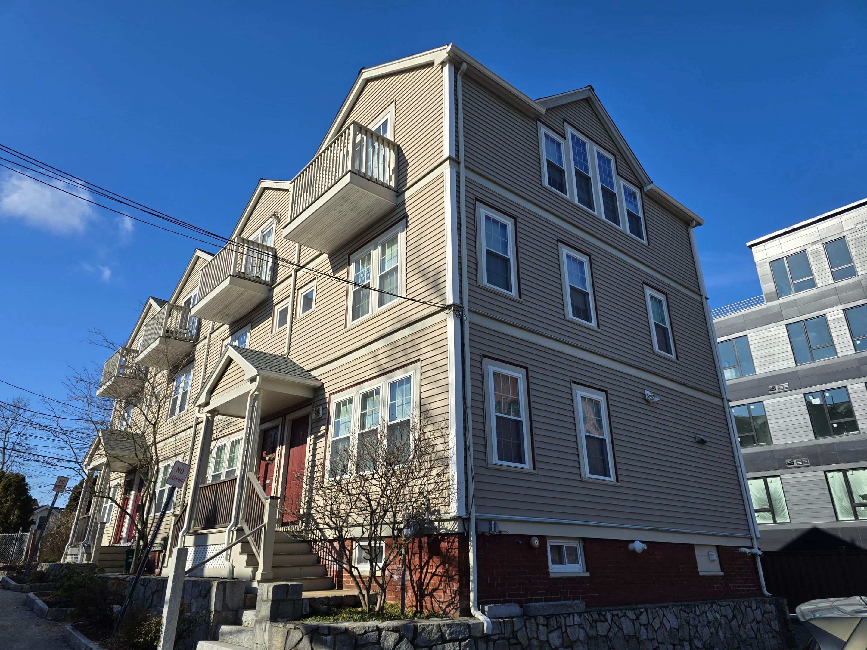 Vinyl siding and Entry Doors inn  Watertown, MA by UBrothers Construction
