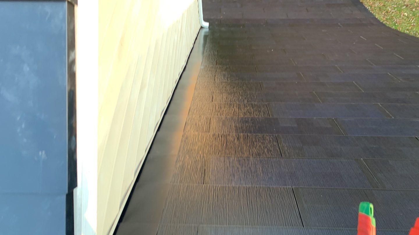 Tesla Solar Roof Replacement by American Home Contractors