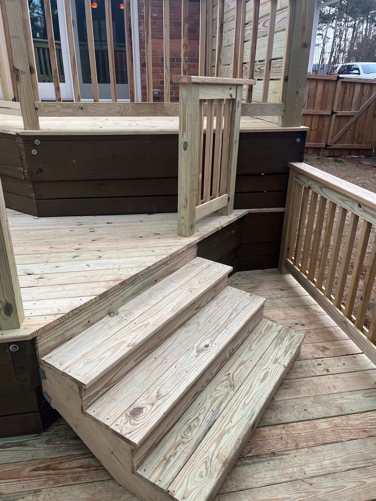 Wood Deck Resurface with Privacy Wall in Buckhead, GA by Nelson Exteriors