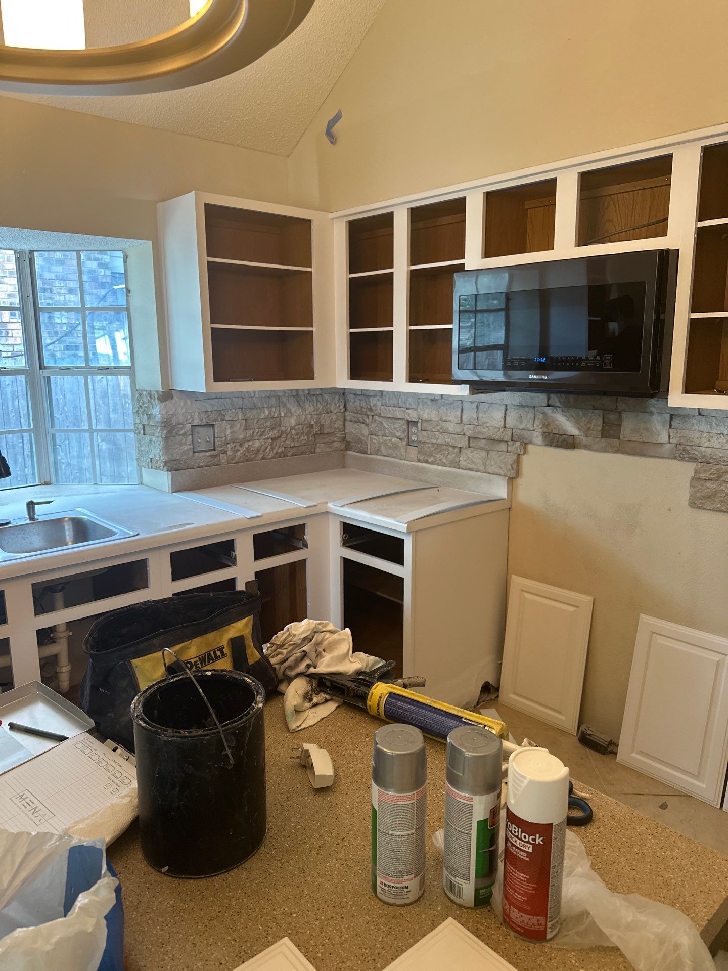 Removed the old stone bulky look for a new fresh upgrade with new Quartz countertops by Mena stone surfaces