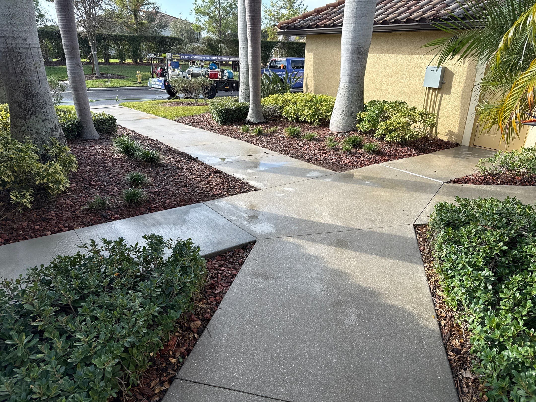 HOA Condo Concrete Driveway & Sidewalk Cleaning – River Strand Community, Bradenton, FL by Sunshine AquaWash