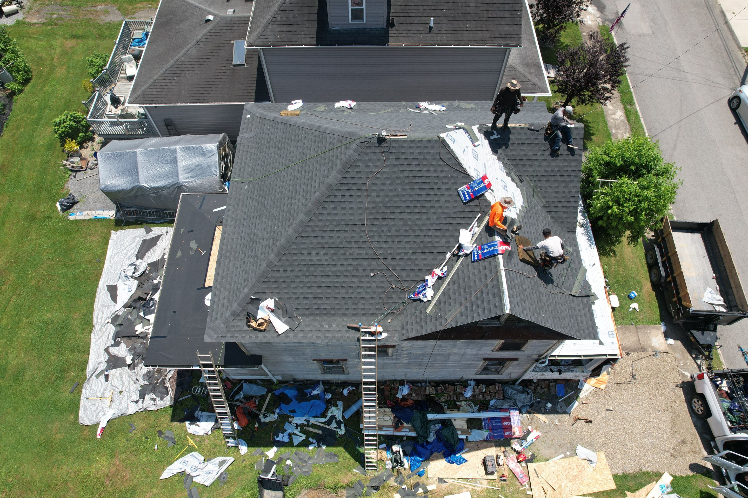 Residential Roofing Installation using GAF Timberline HDZ Charcoal by Rainstoppers Roofing