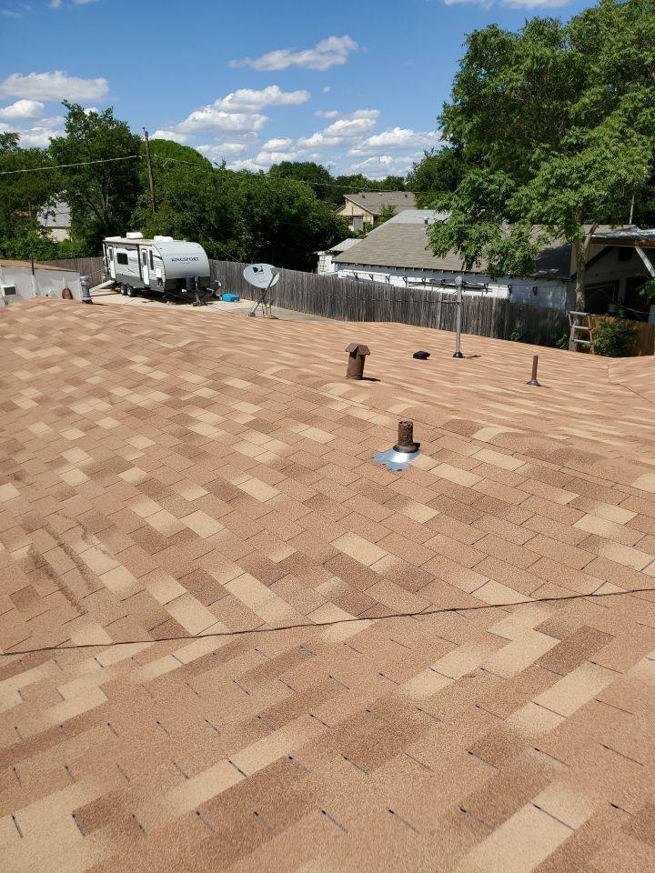 Residential Roofing Installation using Roofing Shingles by Harvey Roofing & Construction