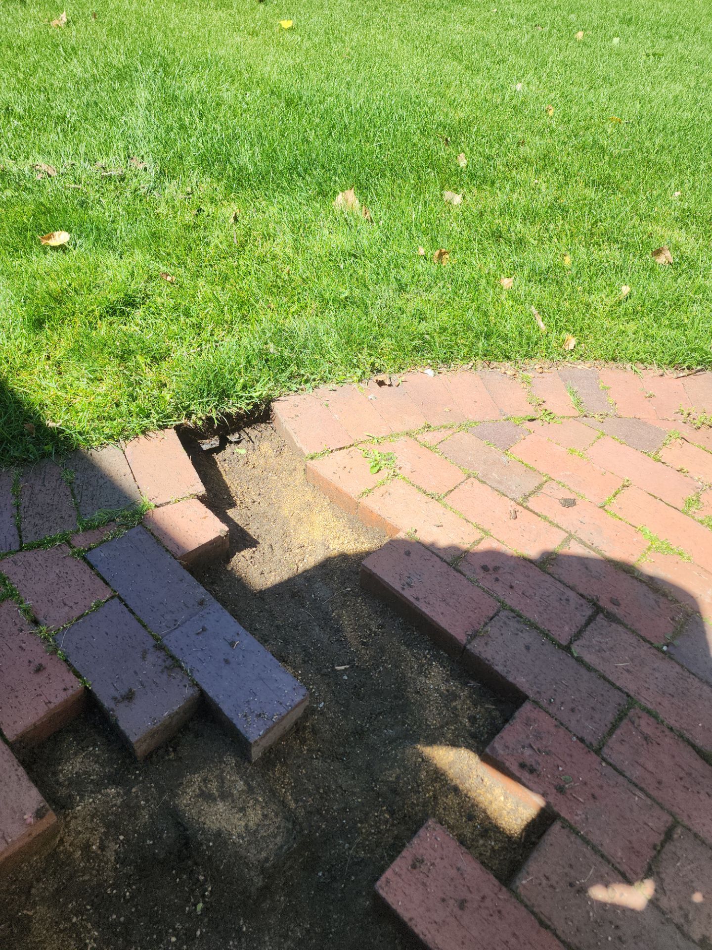 Brick paver repair, cleaning and sealing by Northern Power Washing LLC.