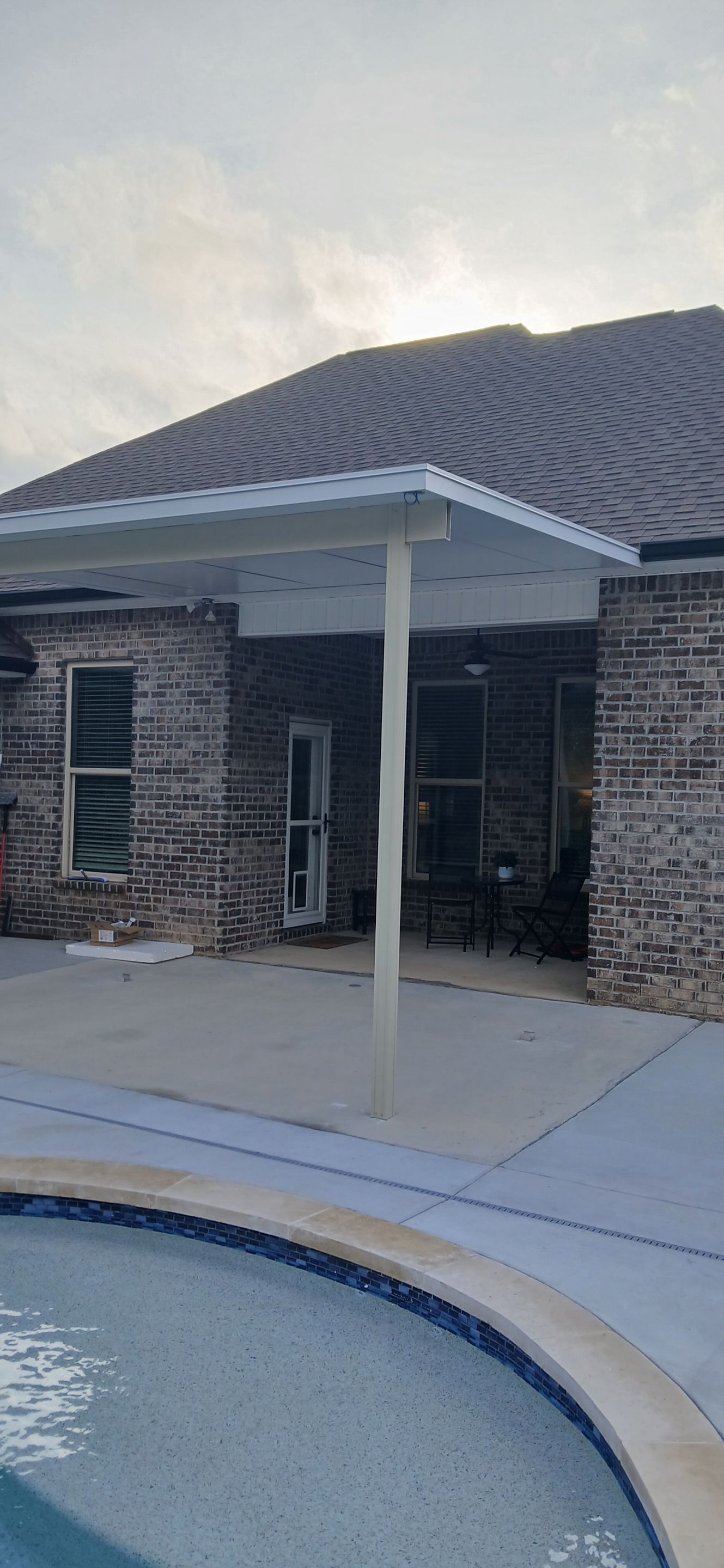 Screenroom Under Existing Canopy by Titan Sunrooms