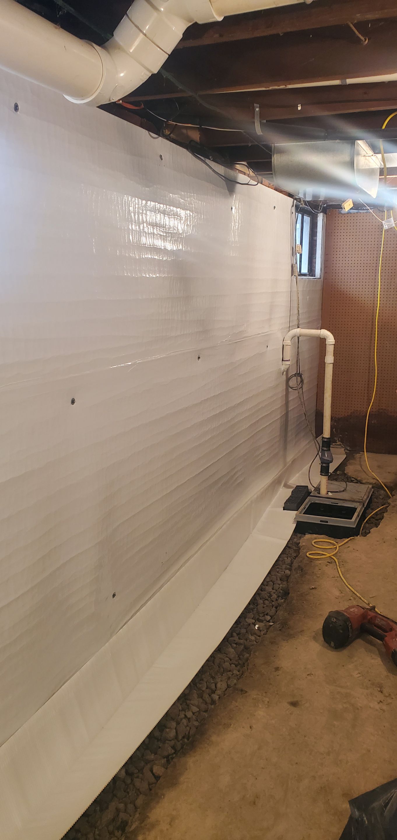 Interior Basement Waterproofing System using GrateDrain Waterproofing System by Toledo Basement Repair 