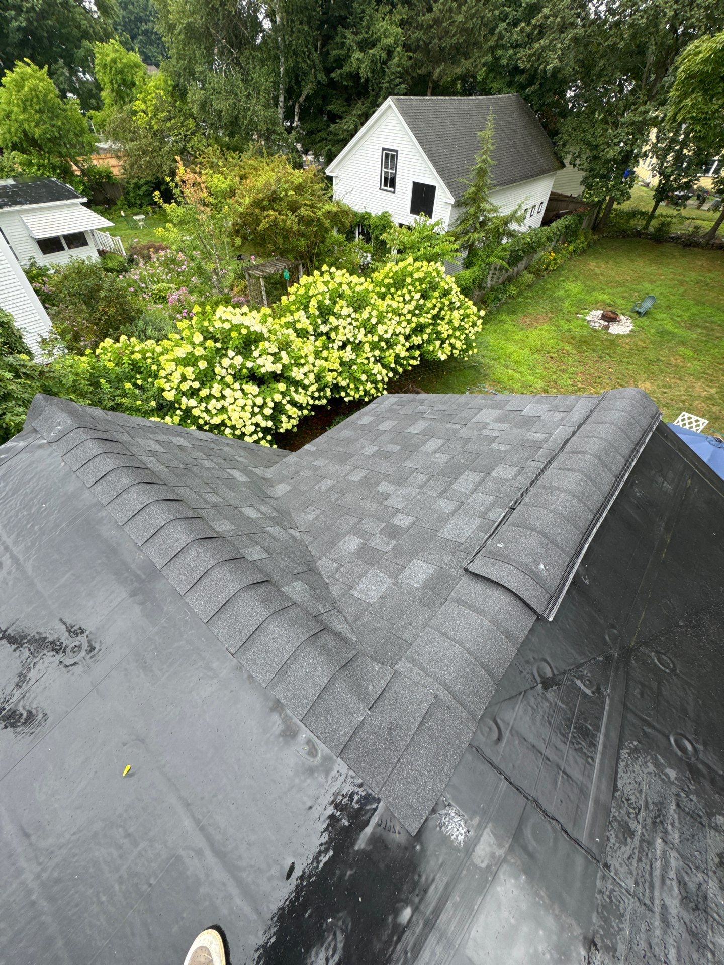 Full Roof Replacement + Custom Gutter Install | Onyx Black Finish by Mighty Dog Roofing of Greater Middlesex County