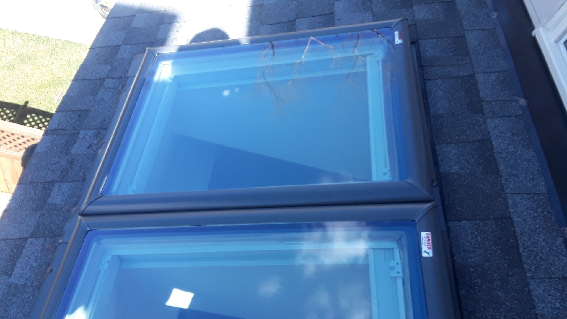 Roof, Window, and Skylight Replacement by American Home Contractors