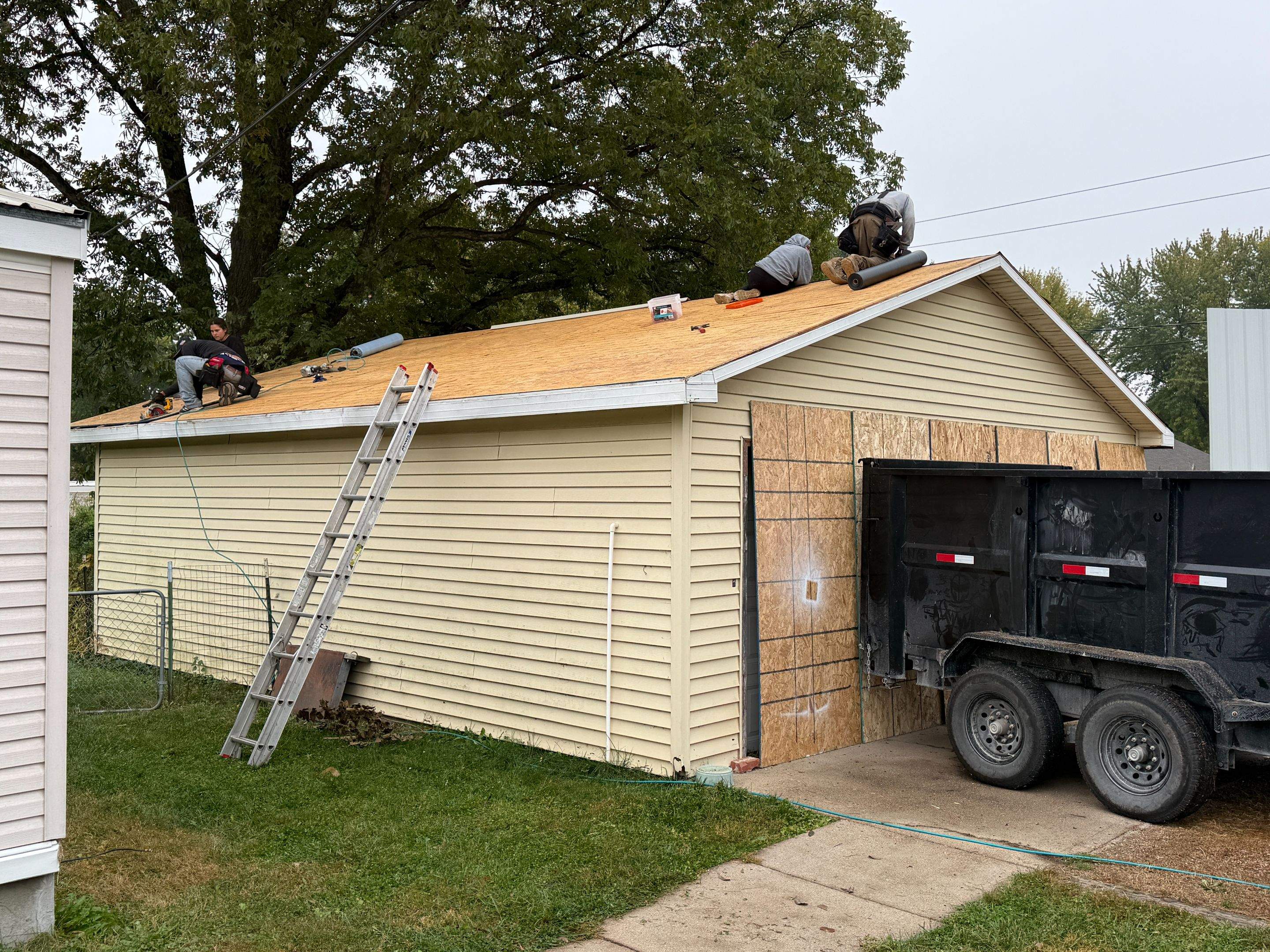Central City Residential Garage Metal Roof Installation by Star Home