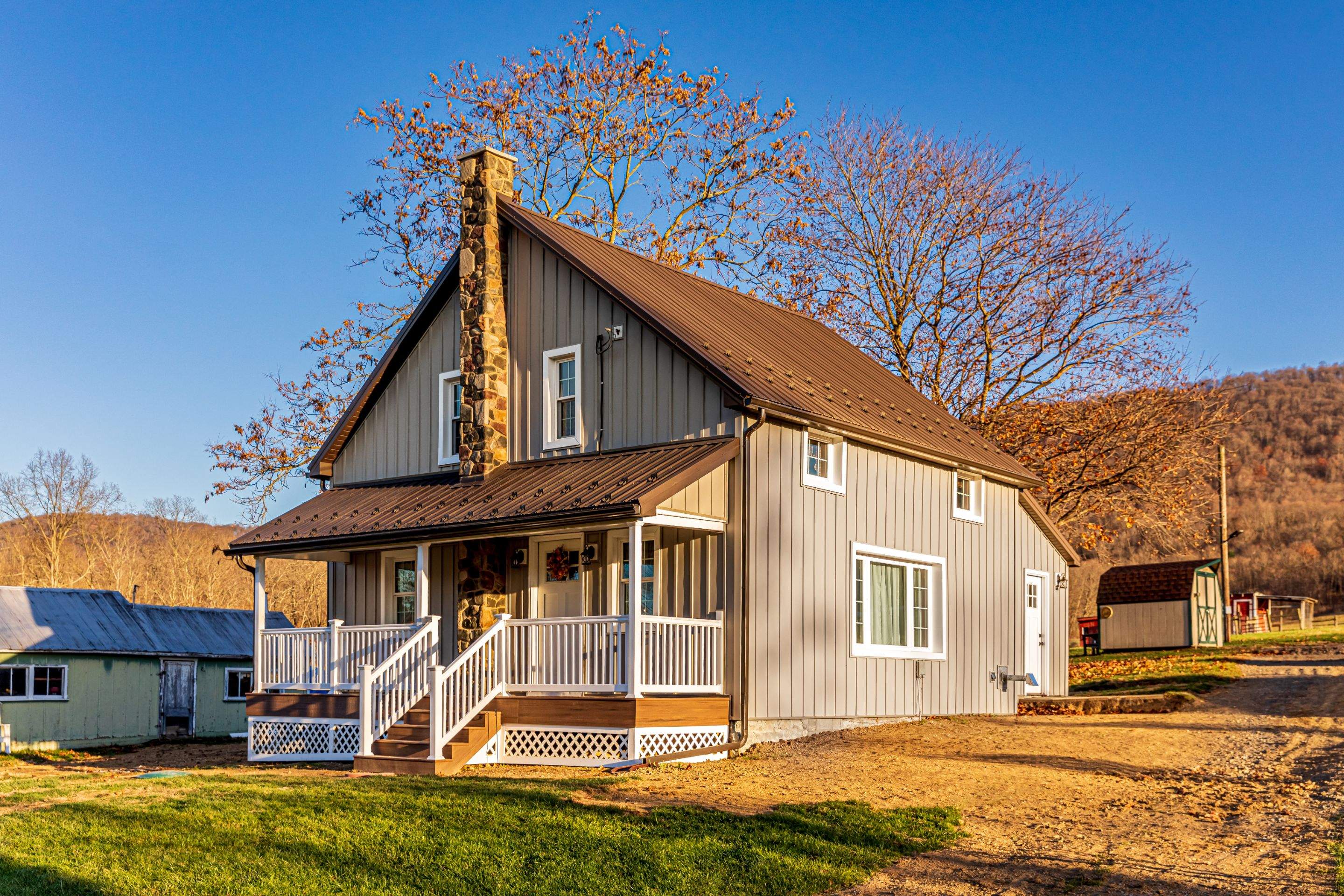 Metal roof-charcoal  Metal siding-ash gray by Esh Builders