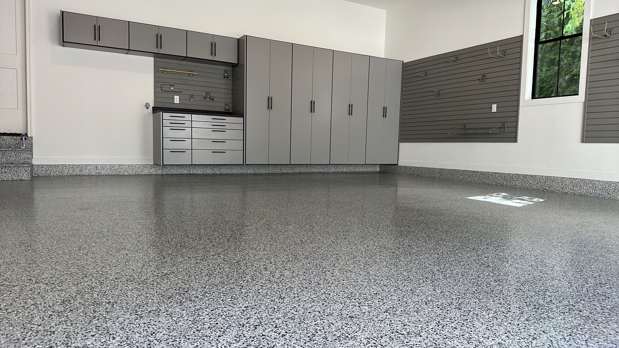 Jeanne E. transformed her garage with cabinets and a Banner Garage Floor by Banner Garage