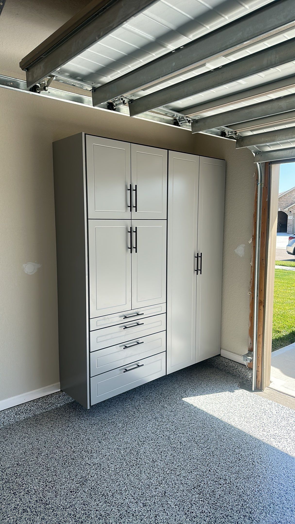 Mike T. changed the look of his garage with a Banner Garage Floor and Storage by Banner Garage