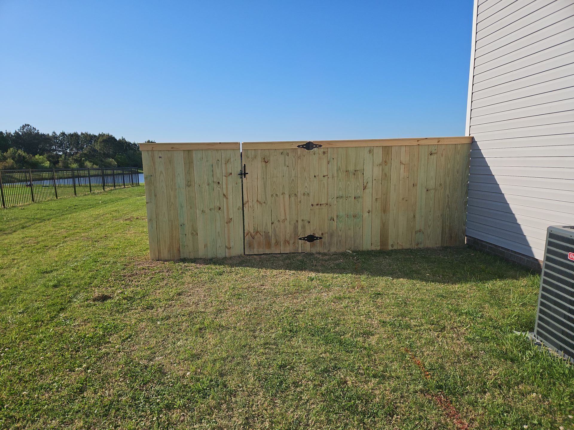 Stronger. Sleeker. Wood. by Tidewater Fence