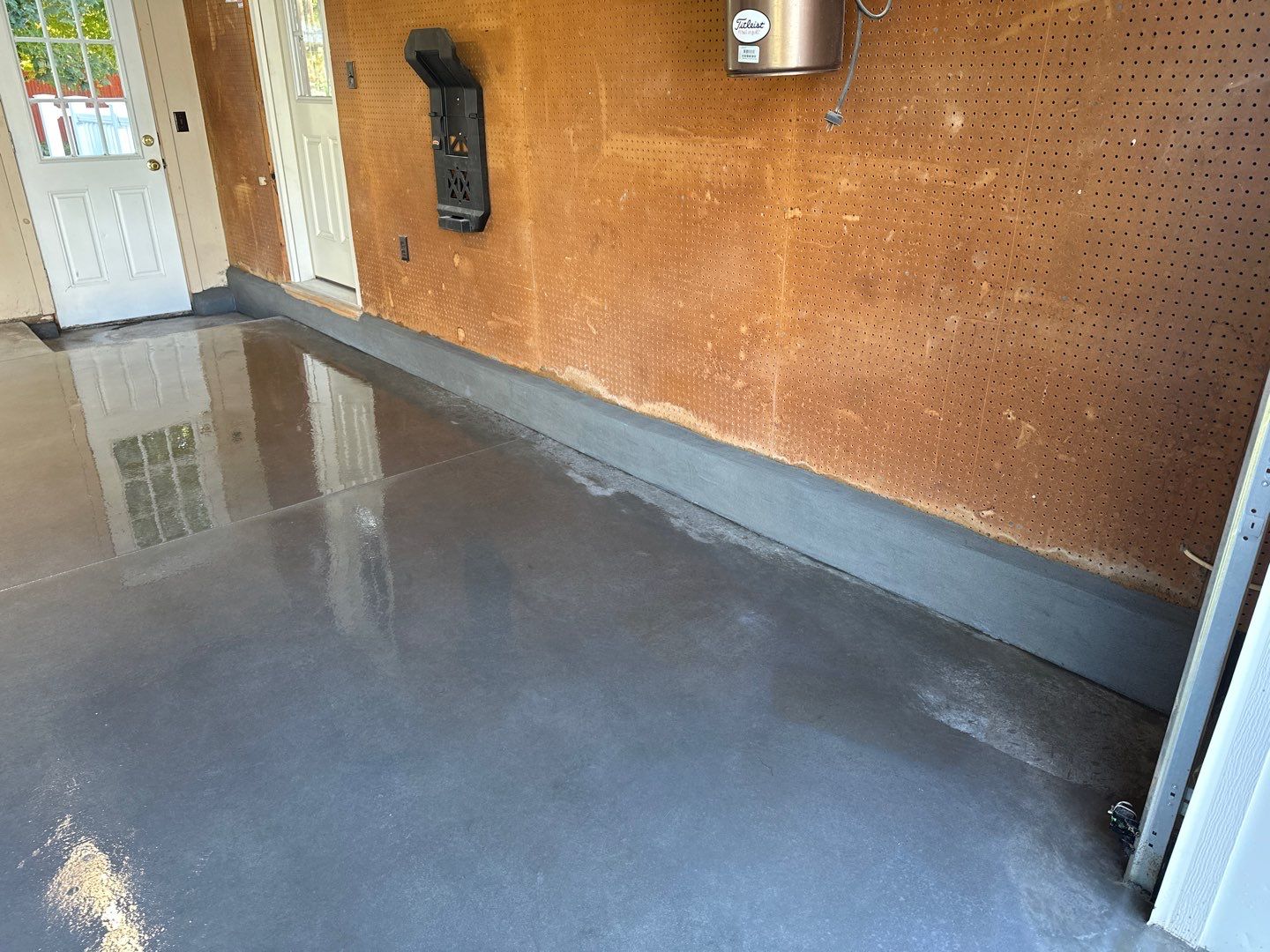 Concrete garage floor replacement and wall repair by NG Masonry & Construction LLC
