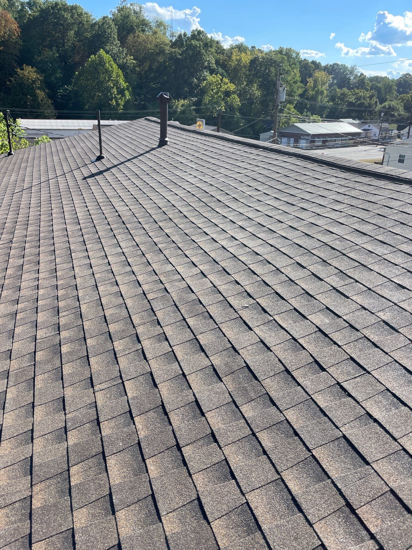 Residential Roofing Installation using GAF TImberline HDZ Hickory by Rainstoppers Roofing
