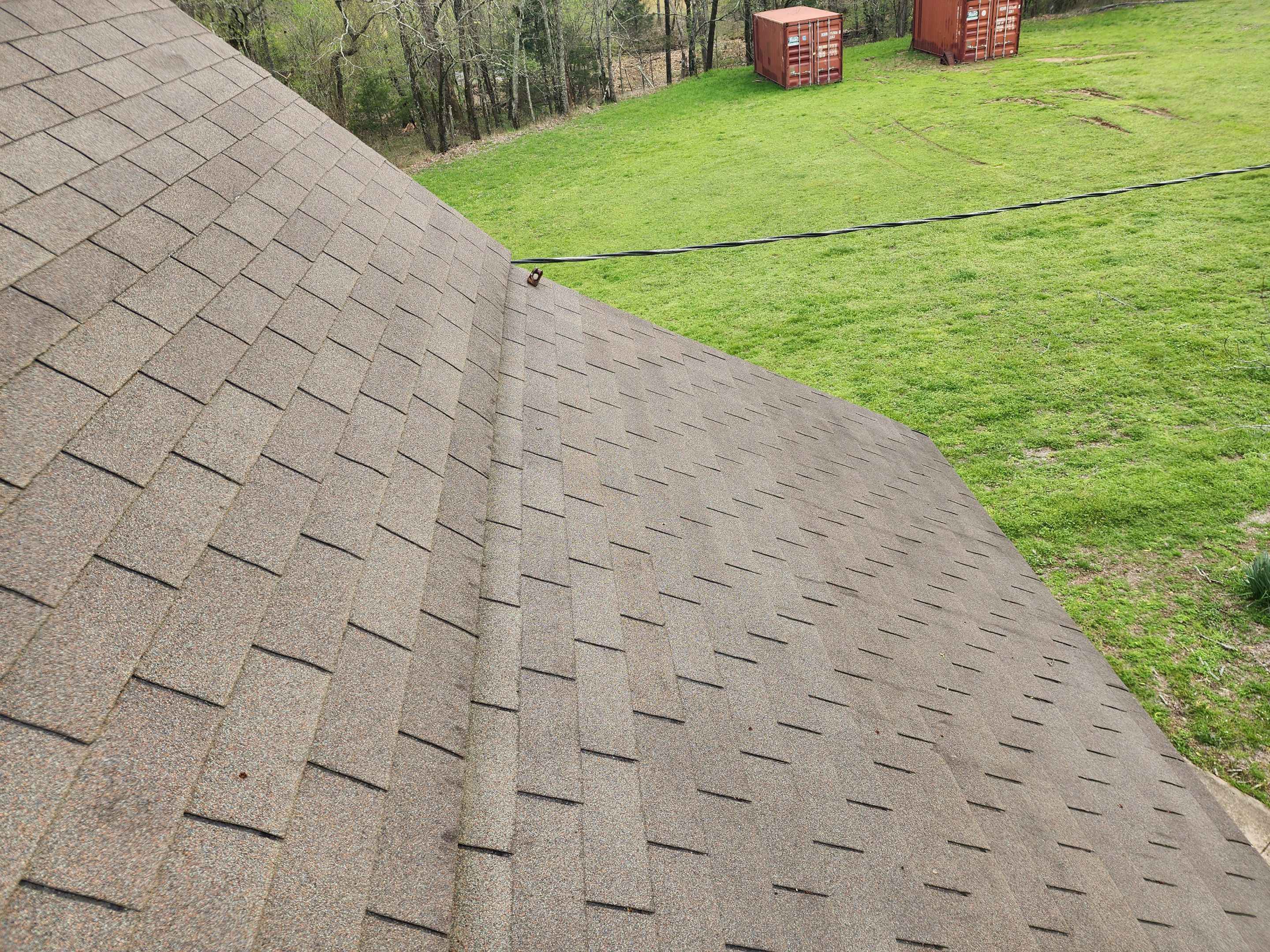 Residential Roofing Installation using 26 Gauge Colored Panels by Hostetler Roofing