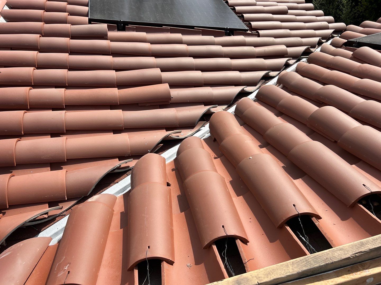 Spanish-Style Roof Replacement with Integrated Solar in Altadena by Reliable Roofing San Diego Inc.